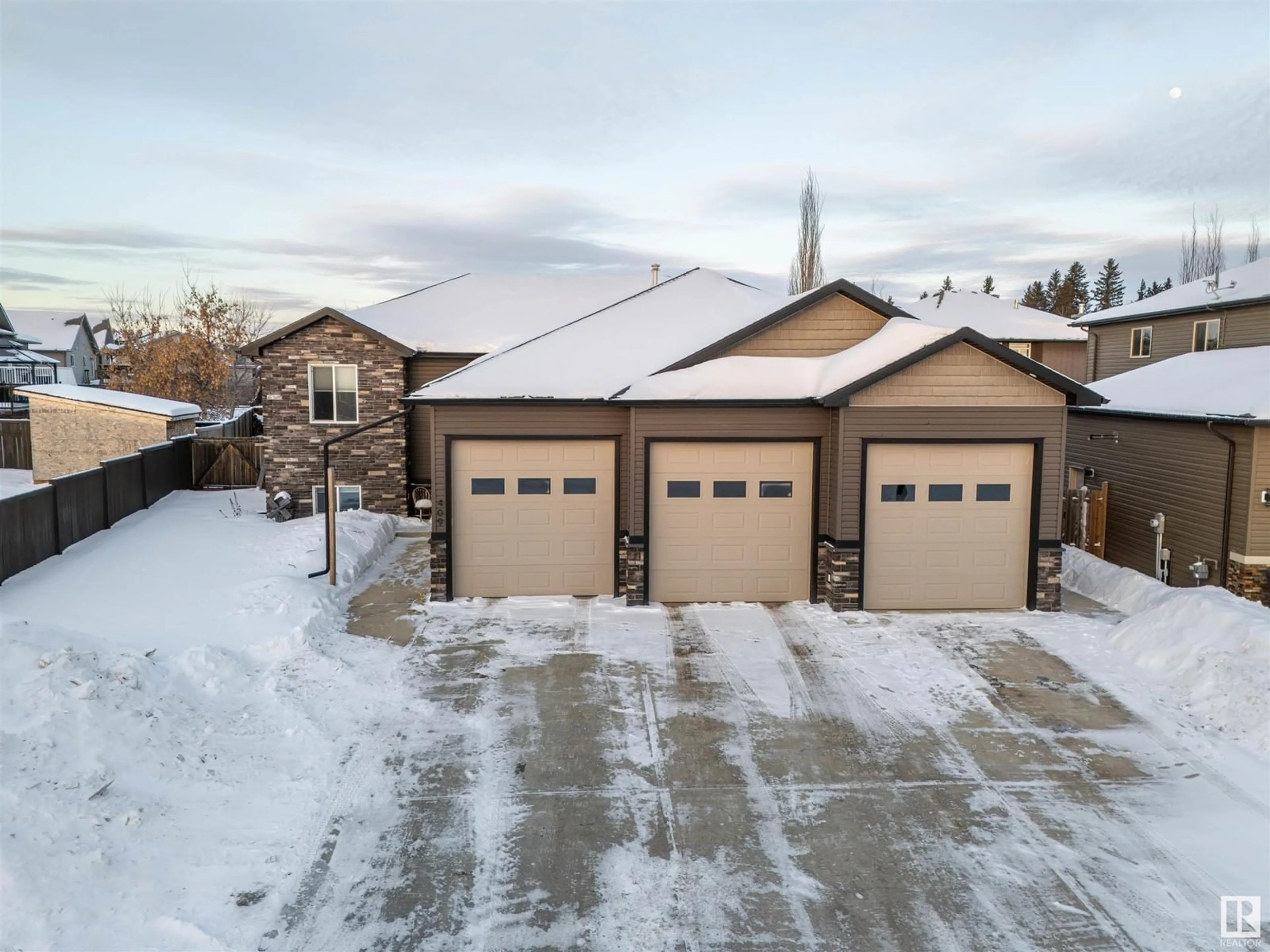 A pic from outside/outdoor area/front of a property/back of a property/a pic from drone, street for 409 26 ST, Cold Lake Alberta T9M0E9