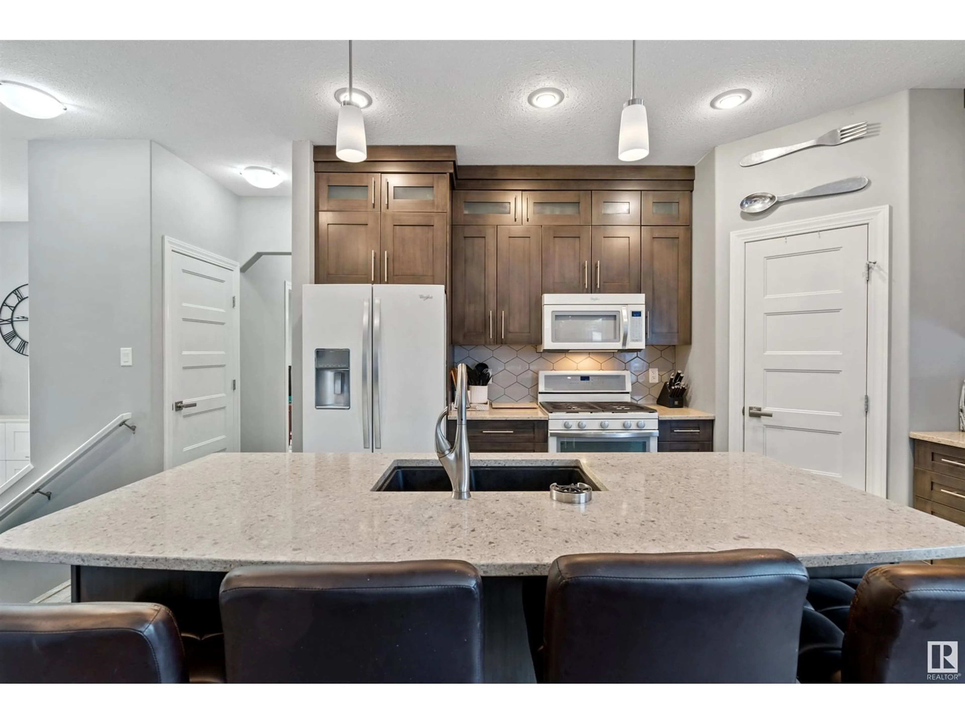 Open concept kitchen, ceramic/tile floor for 409 26 ST, Cold Lake Alberta T9M0E9