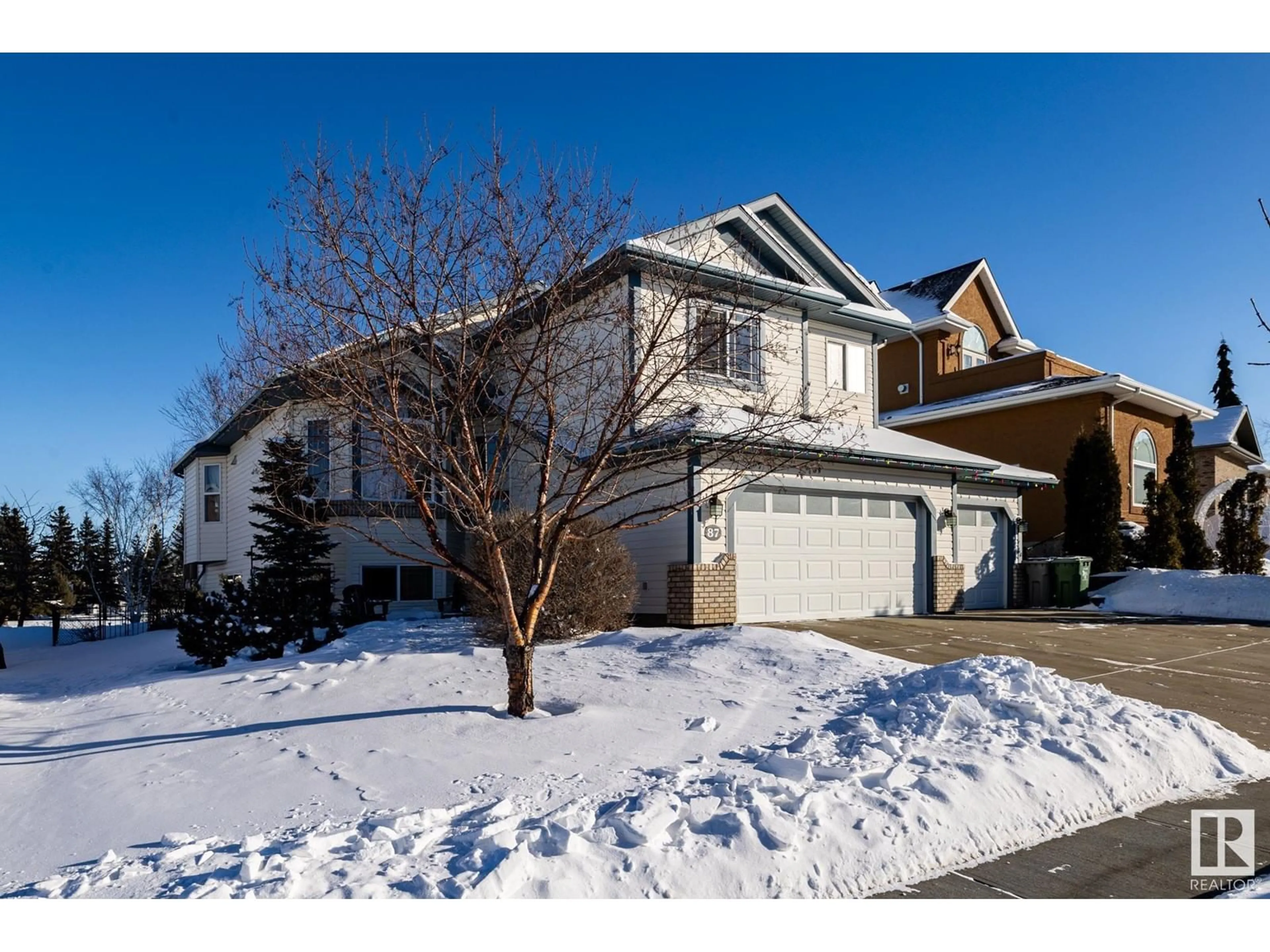 Home with vinyl exterior material, street for 87 PROMENADE BV, Beaumont Alberta T4X1R1