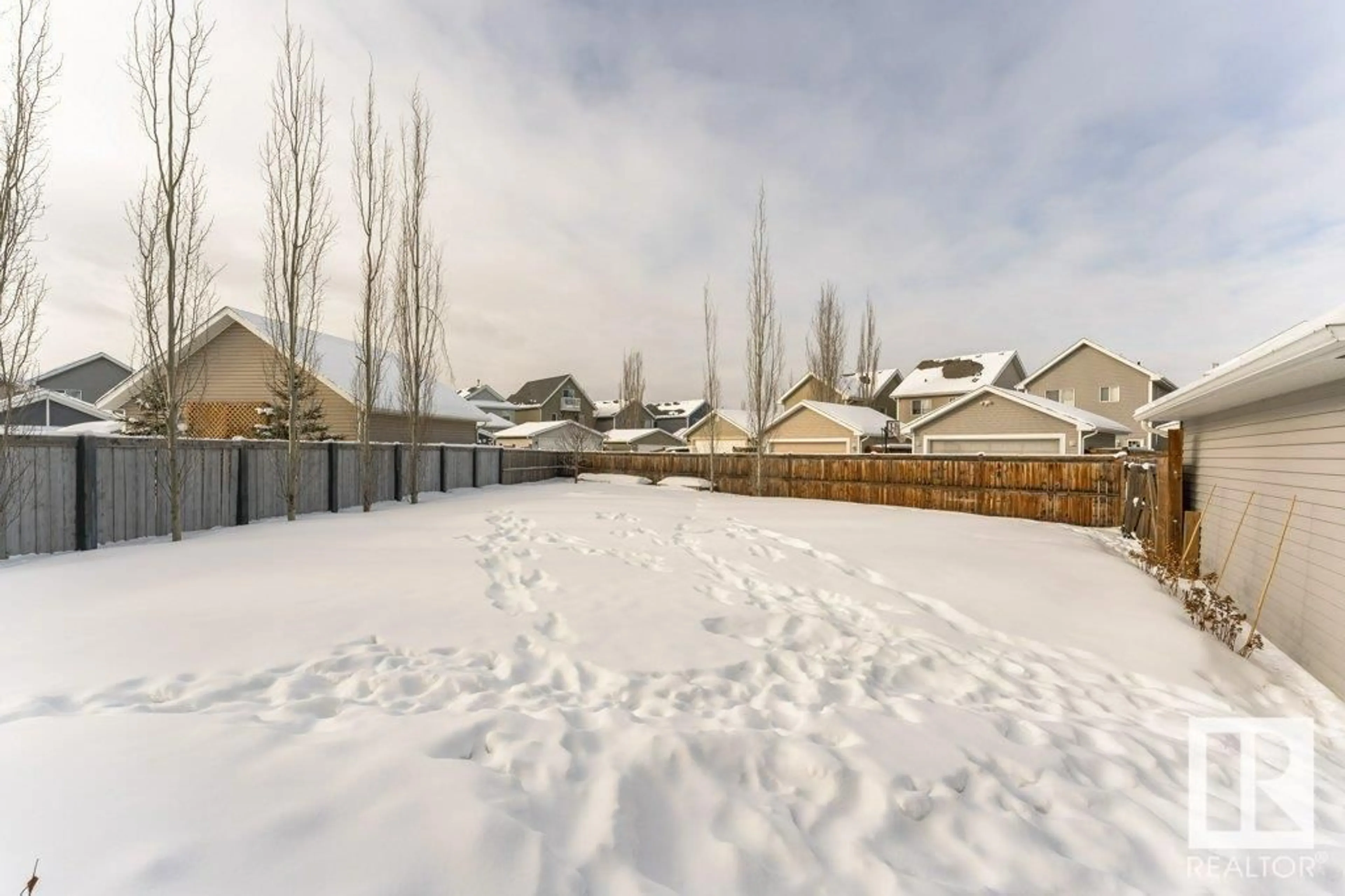 A pic from outside/outdoor area/front of a property/back of a property/a pic from drone, street for 7212 21 AV SW, Edmonton Alberta T6X0L5