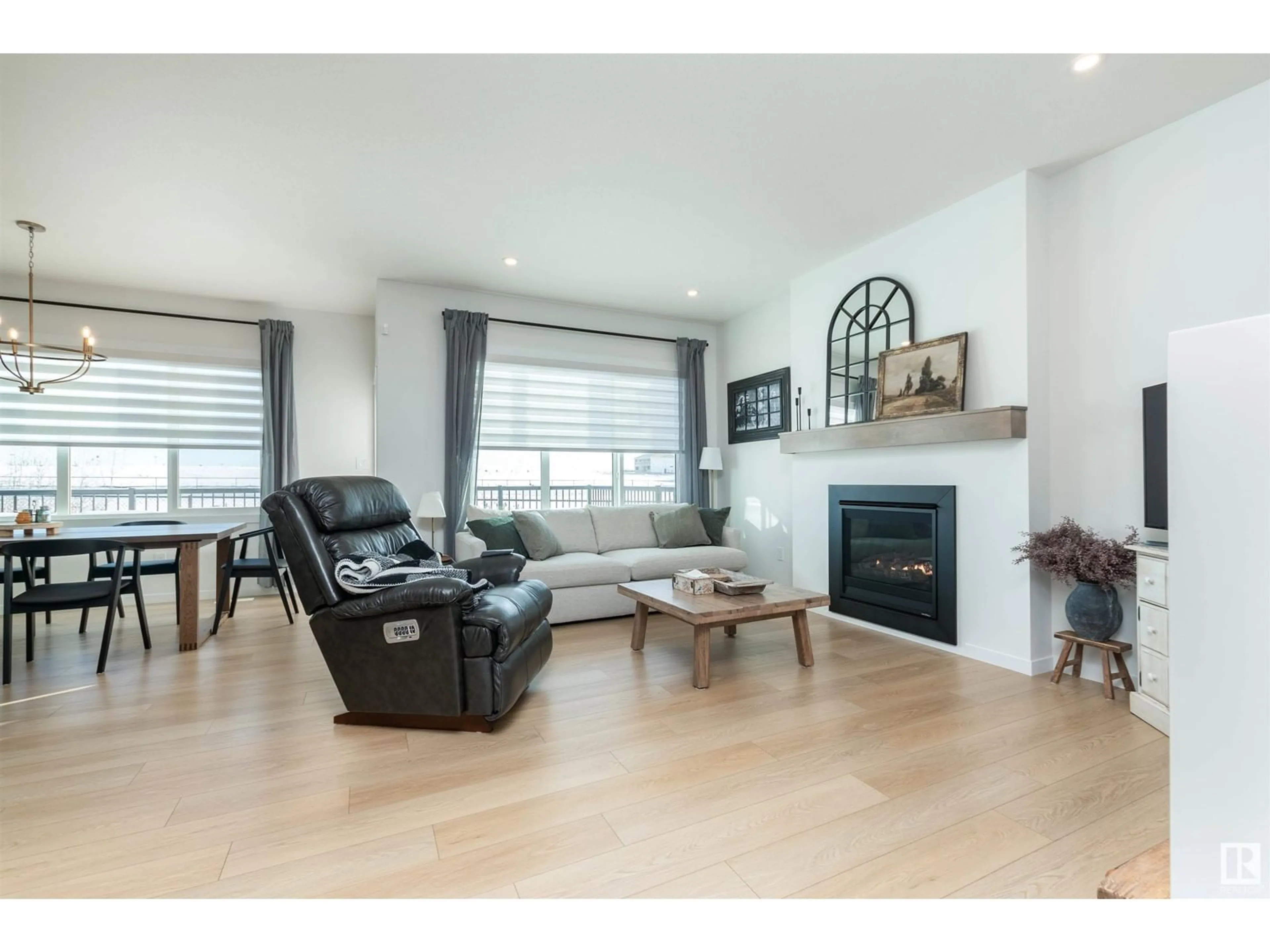 Living room with furniture, wood/laminate floor for 13 BERWICK BA, Ardrossan Alberta T8E0B3