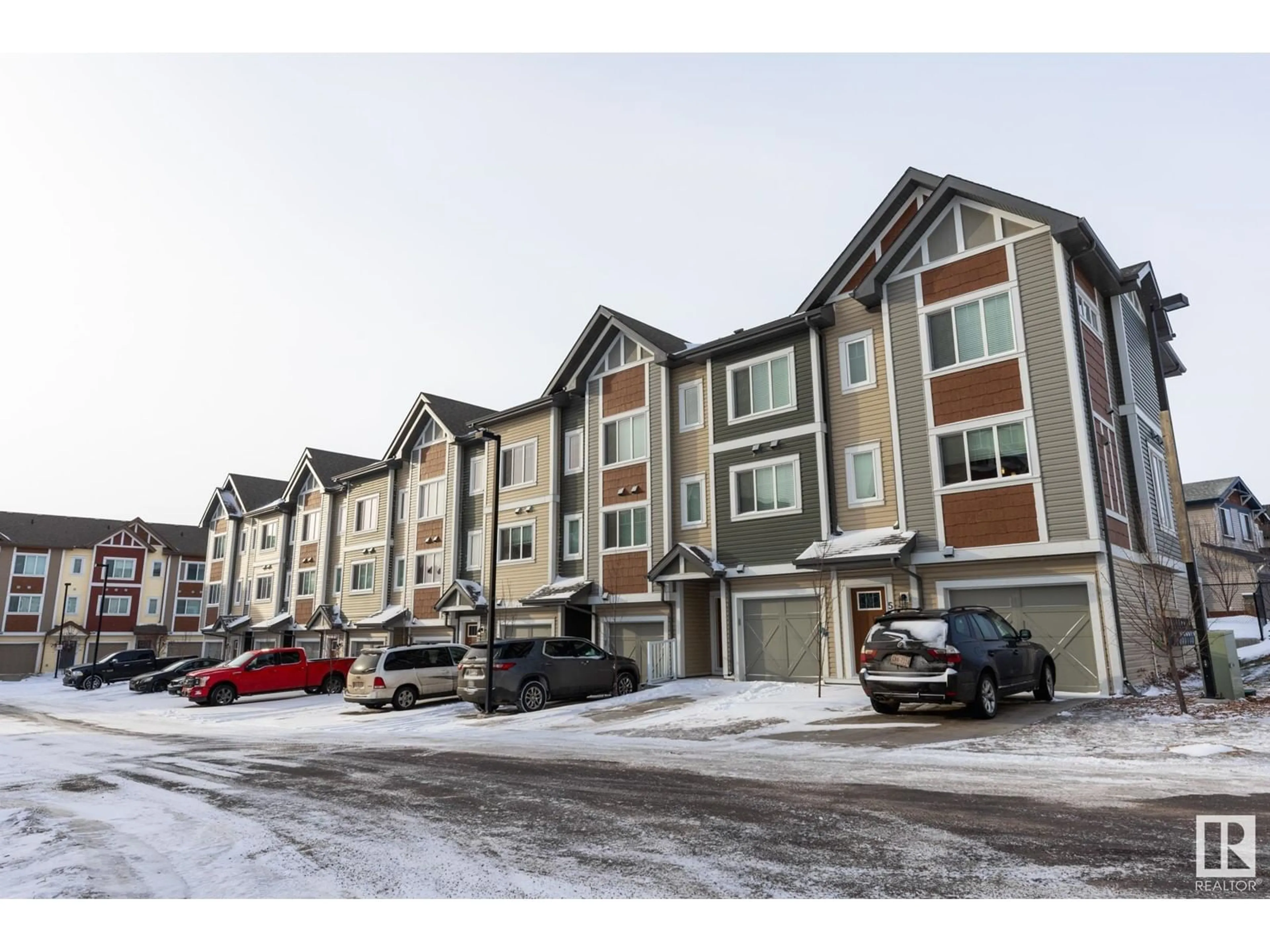 A pic from outside/outdoor area/front of a property/back of a property/a pic from drone, mountain view for #100 320 SECORD BV NW, Edmonton Alberta T5T7E8