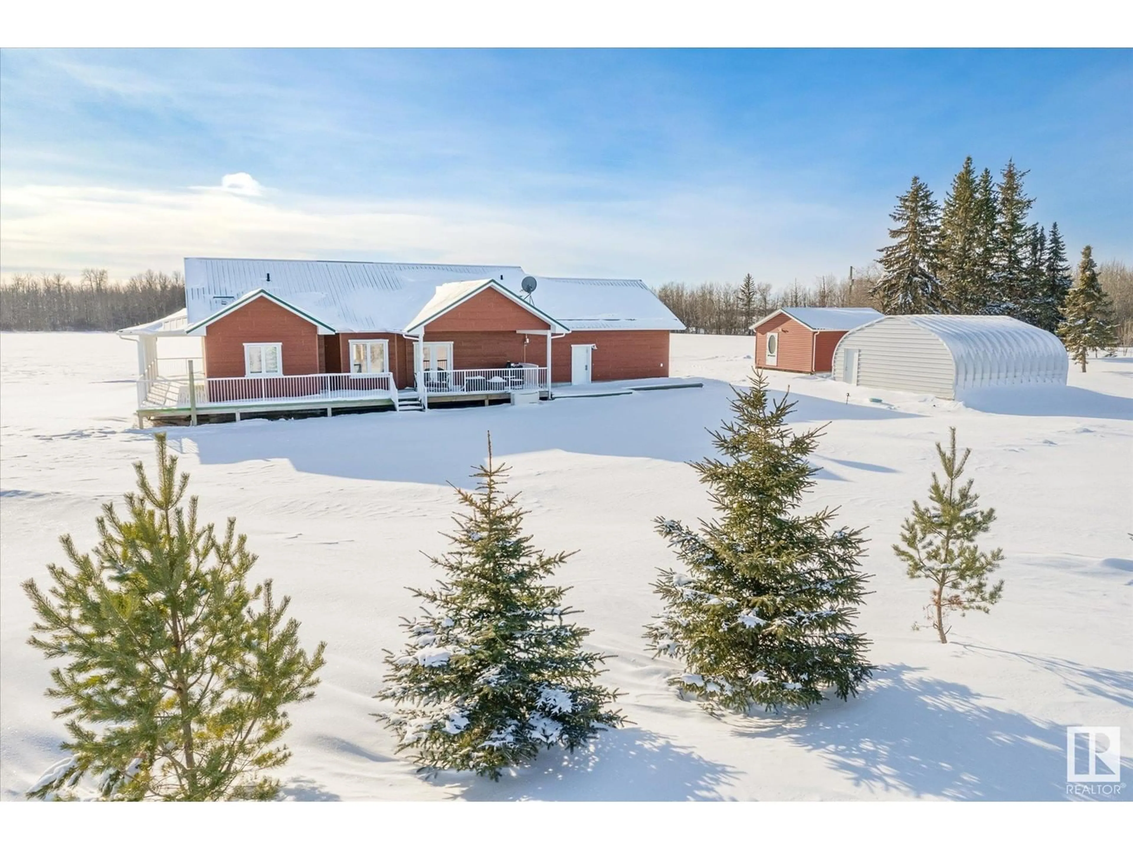 A pic from outside/outdoor area/front of a property/back of a property/a pic from drone, mountain view for 60521 Rge Rd 203, Rural Thorhild County Alberta T0A2V0