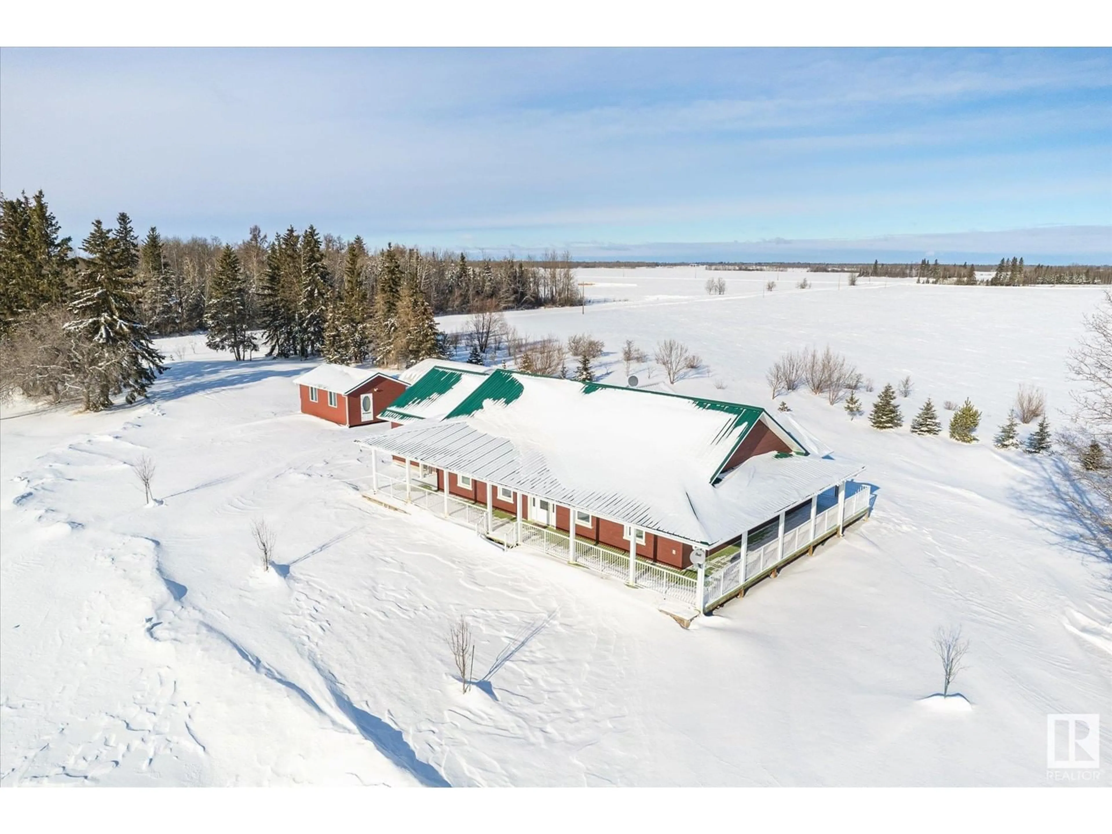 A pic from outside/outdoor area/front of a property/back of a property/a pic from drone, building for 60521 Rge Rd 203, Rural Thorhild County Alberta T0A2V0