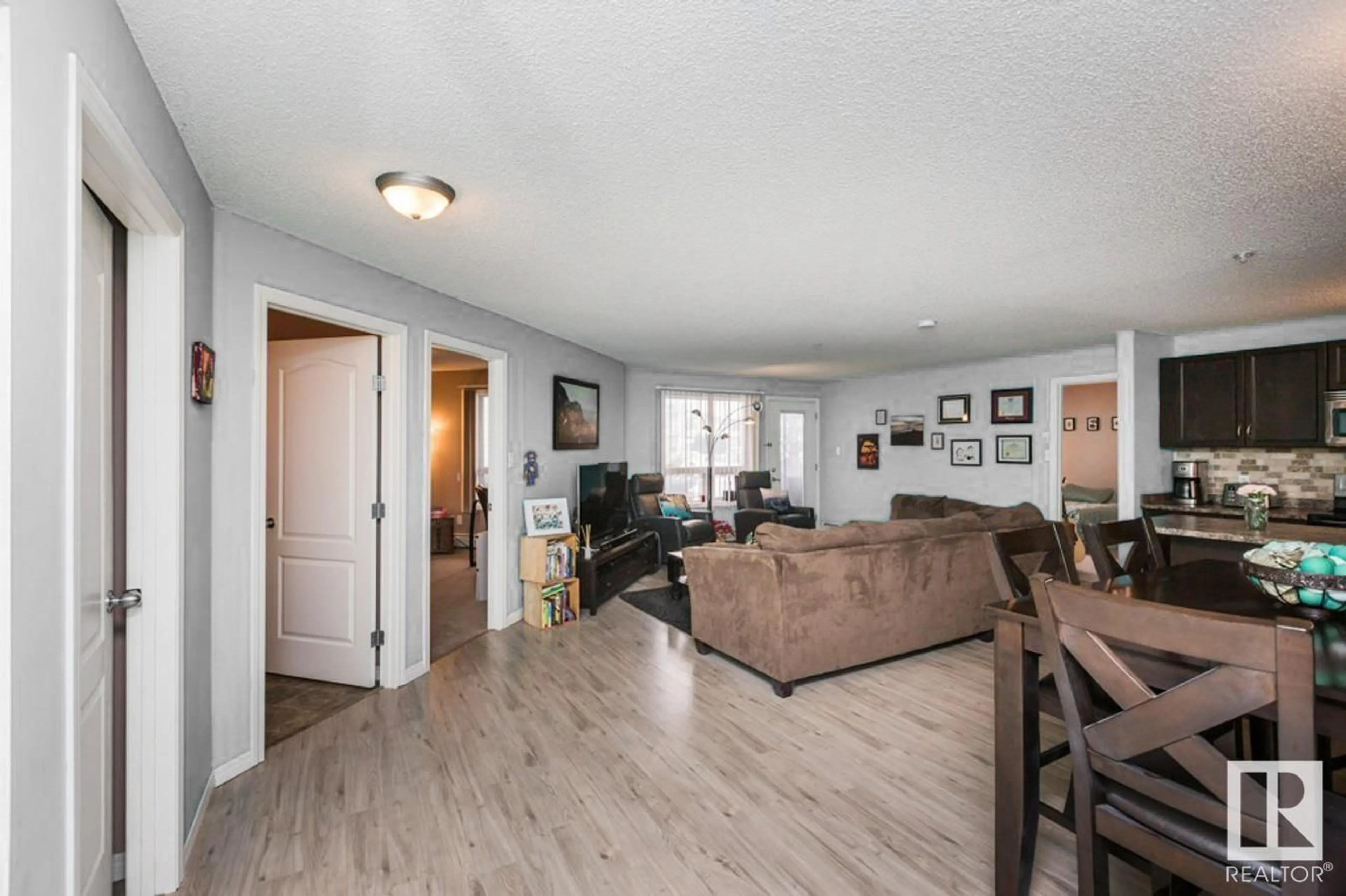 Living room with furniture, unknown for #1104 - 330 CLAREVIEW STATION DR, Edmonton Alberta T5Y0E6