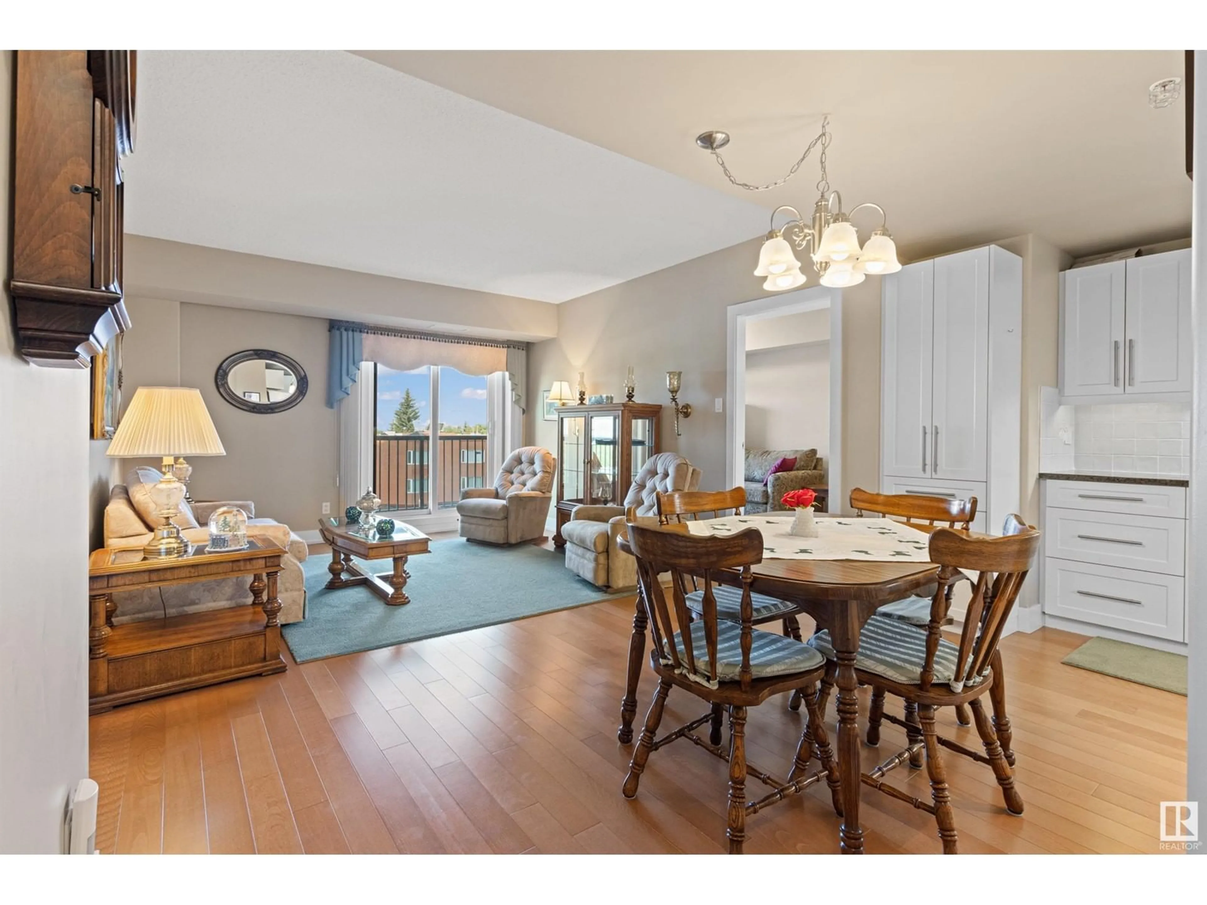 Dining room, wood/laminate floor for #407 6608 28 AV NW, Edmonton Alberta T6K2R1