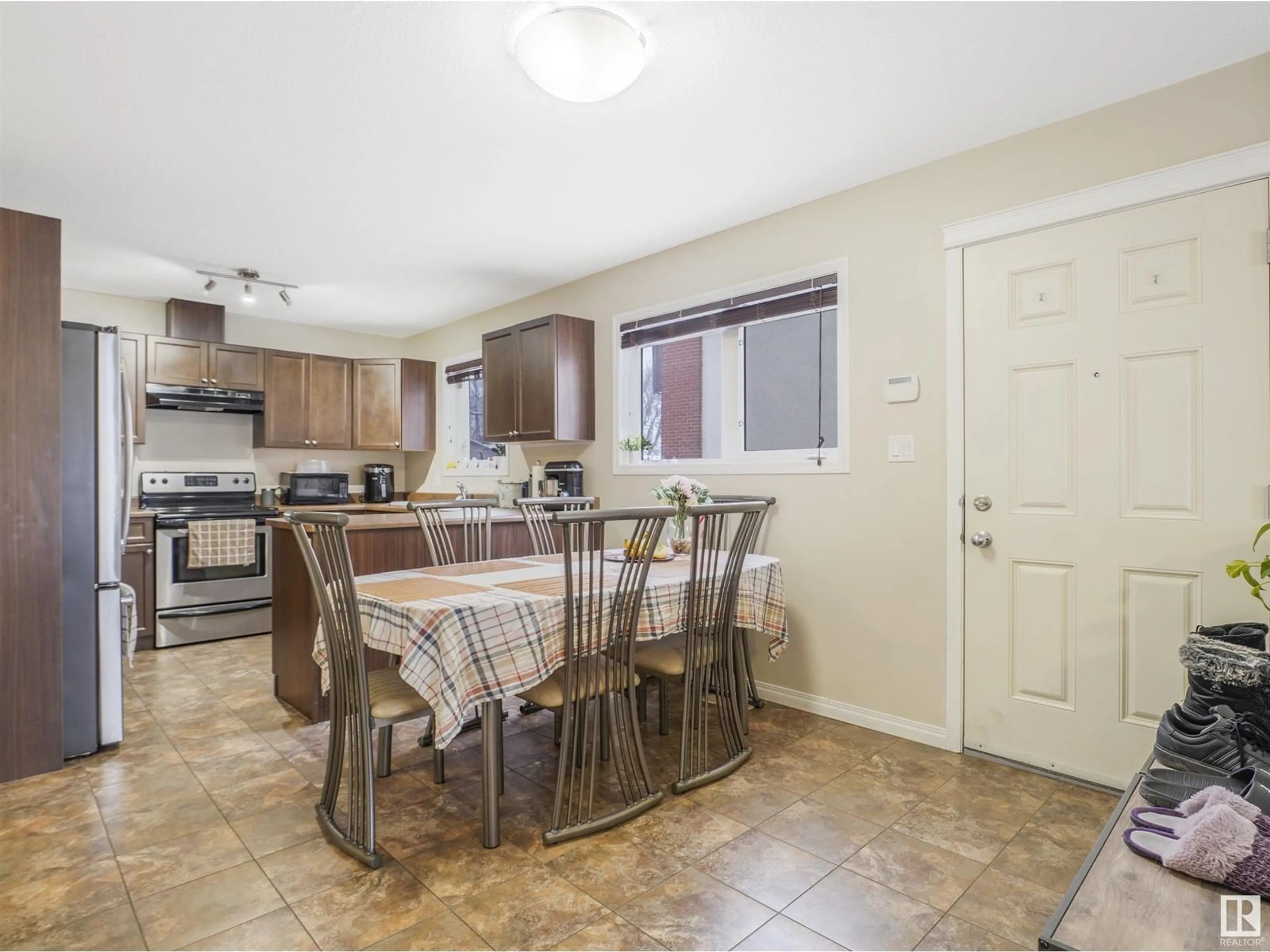 Open concept kitchen, ceramic/tile floor for #2 11841 97 ST NW, Edmonton Alberta T5G1Y4