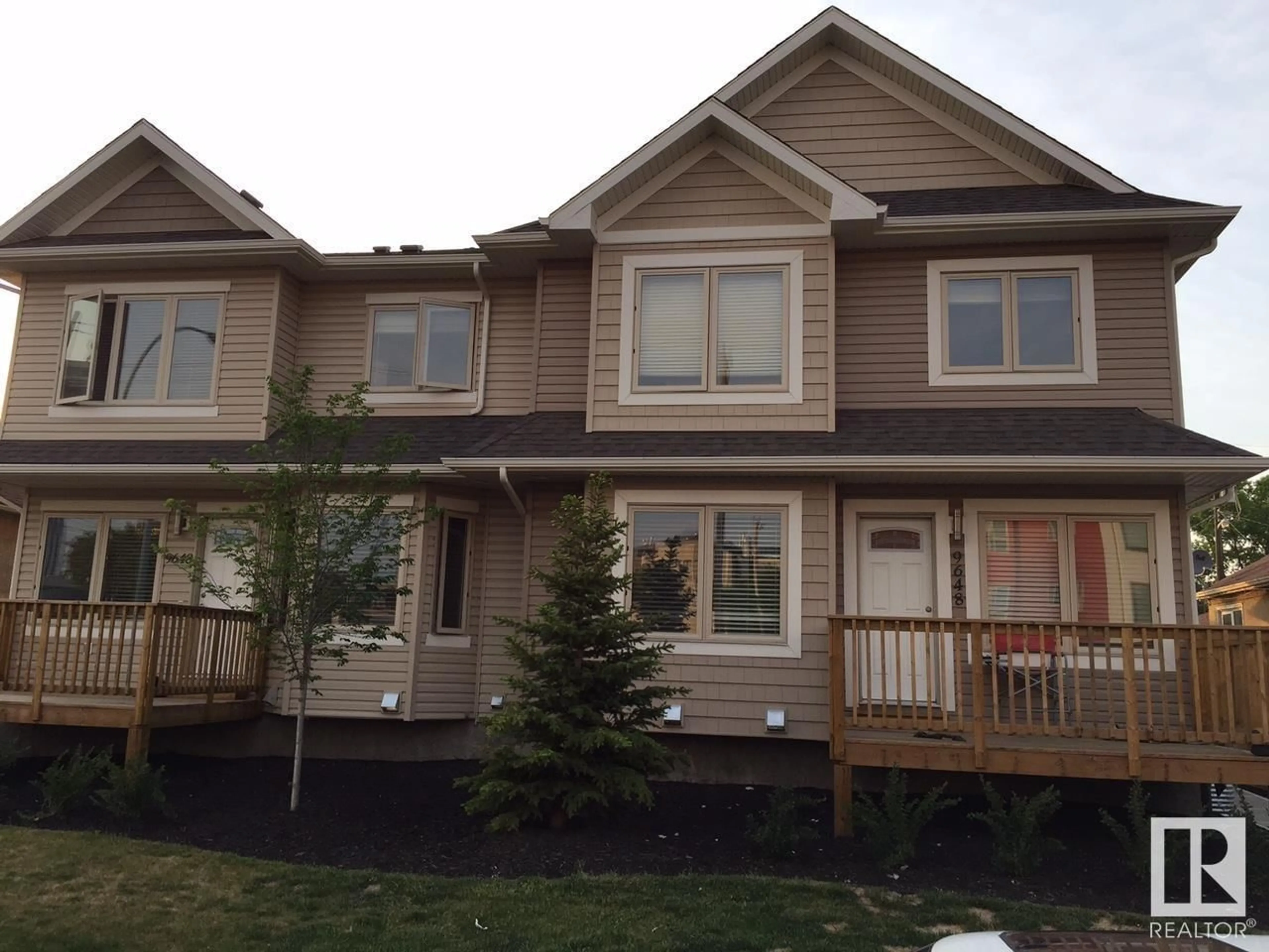 Home with vinyl exterior material, street for #3 9648 106 AV NW, Edmonton Alberta T5H0N4