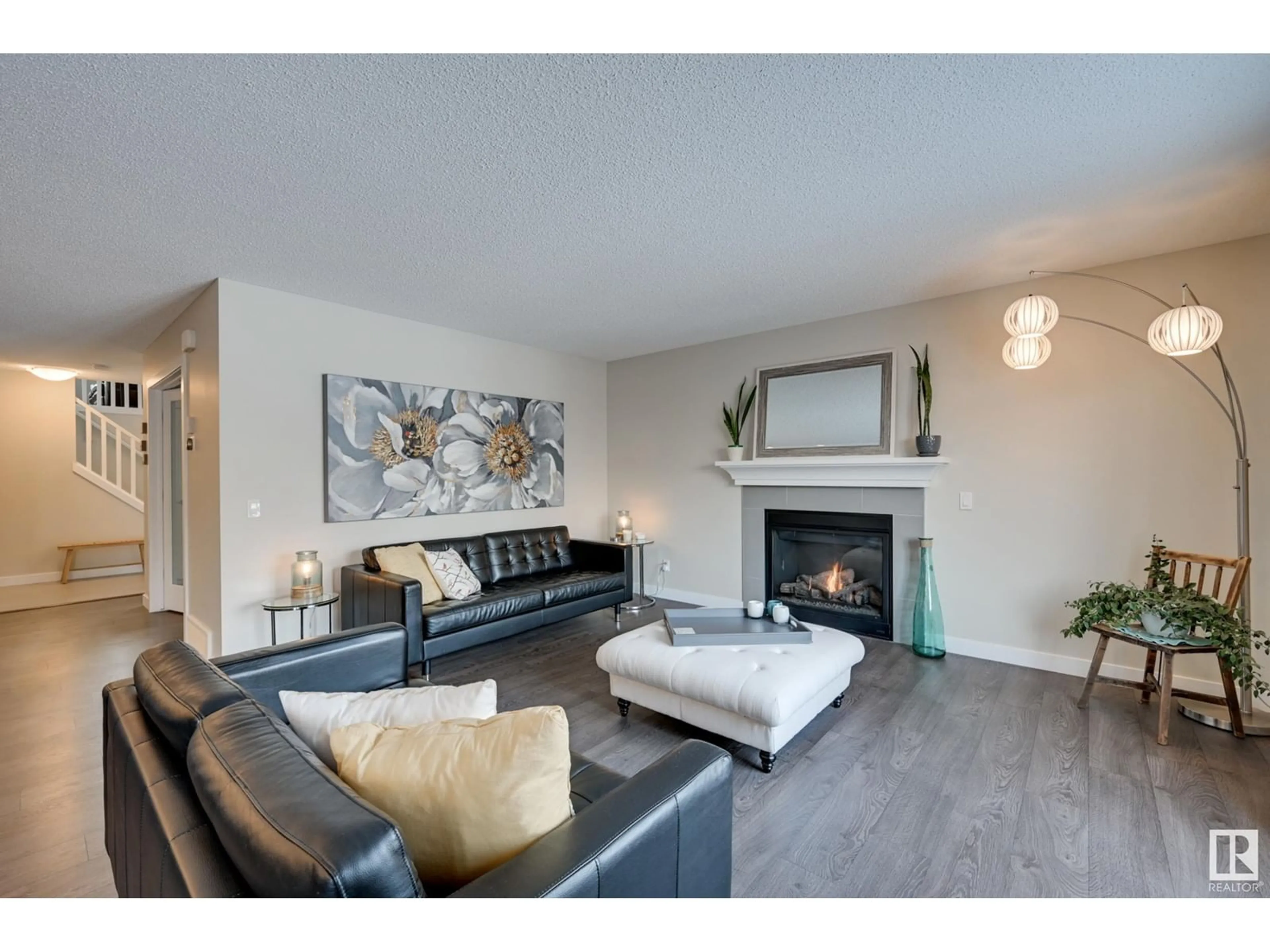 Living room with furniture, wood/laminate floor for 13824 165 AV NW, Edmonton Alberta T6V0G9