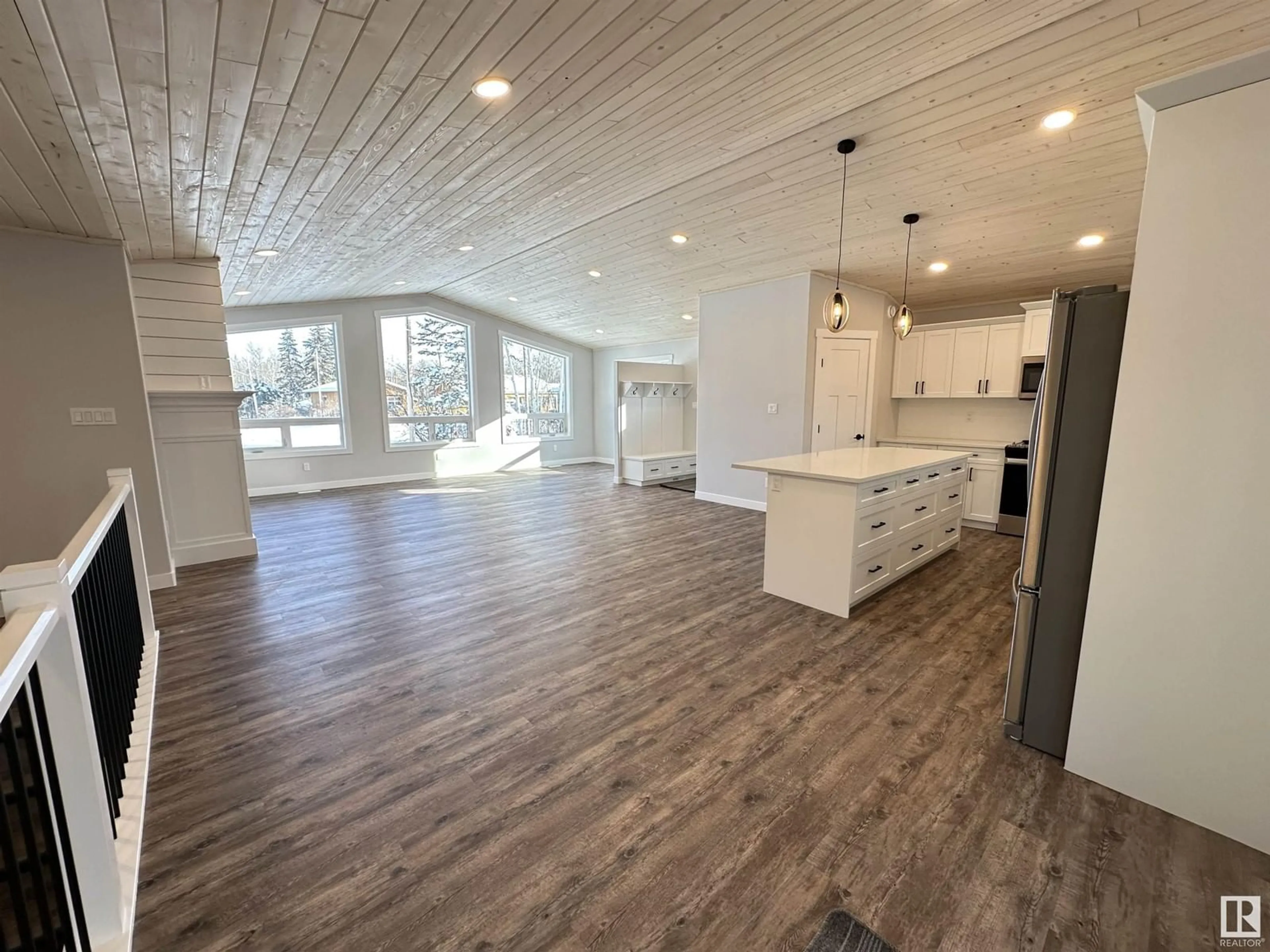 Open concept kitchen, wood/laminate floor for 5619 49 ST, Rural Lac Ste. Anne County Alberta T0E0A0