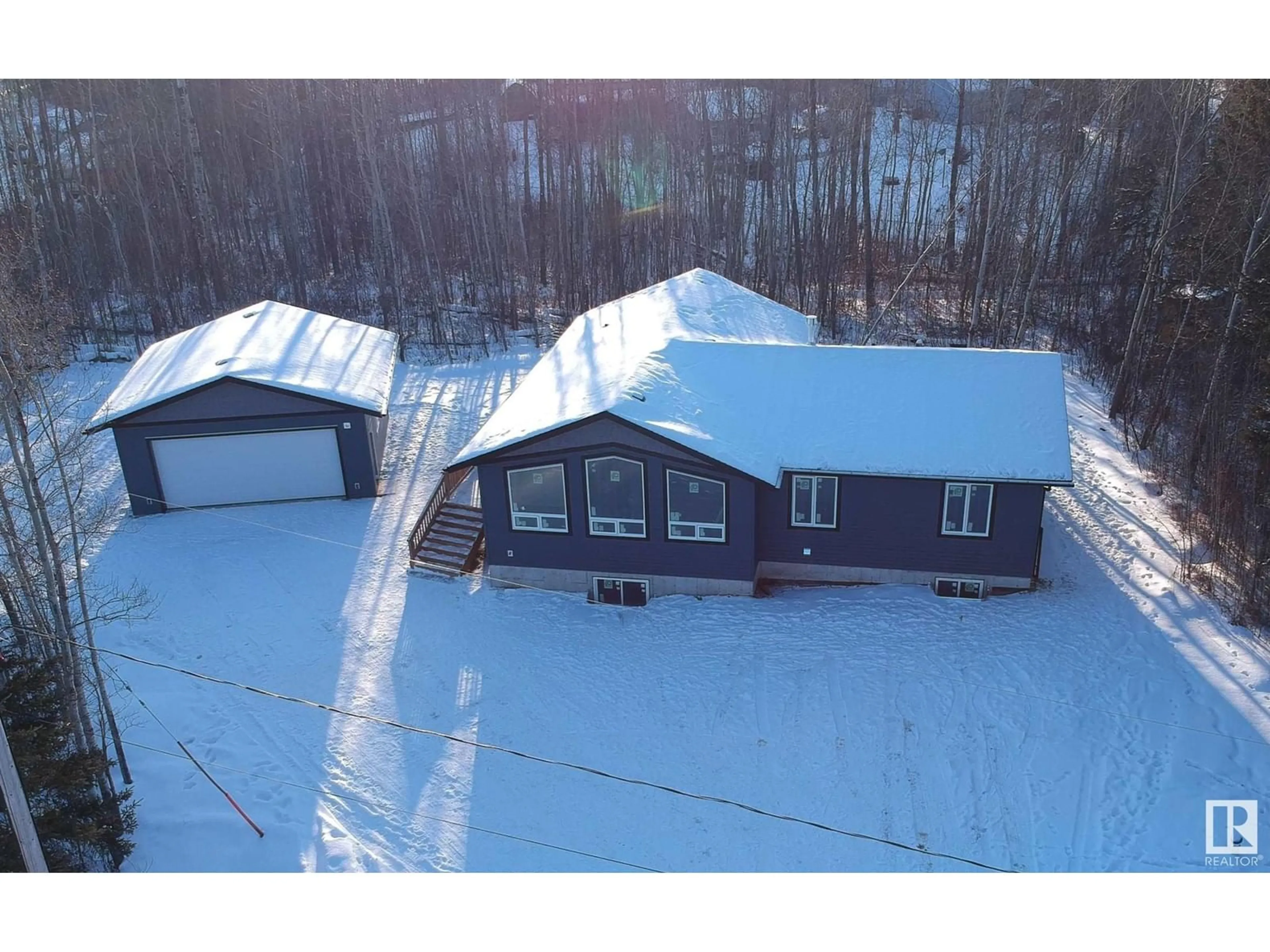 A pic from outside/outdoor area/front of a property/back of a property/a pic from drone, building for 5619 49 ST, Rural Lac Ste. Anne County Alberta T0E0A0