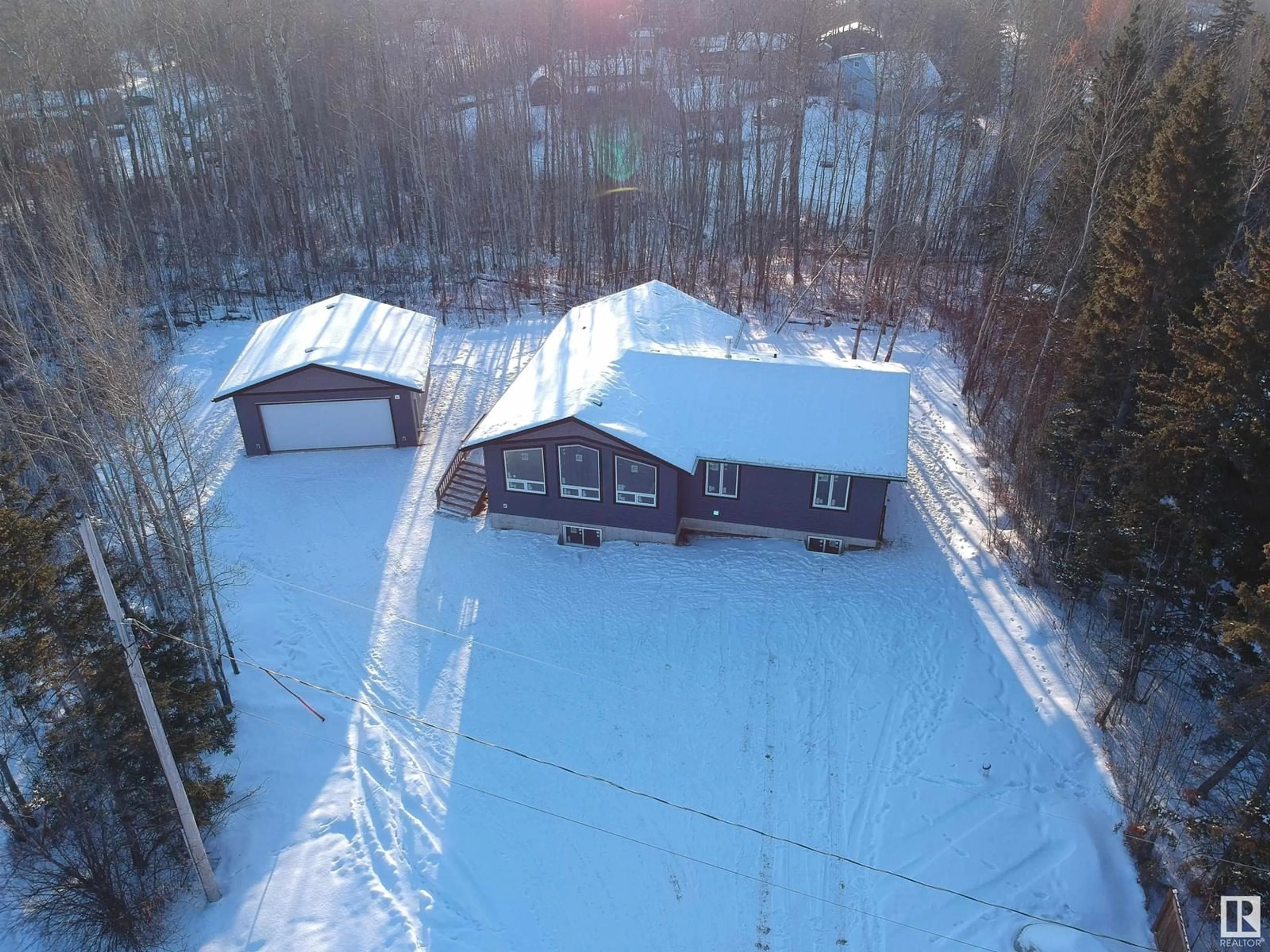 A pic from outside/outdoor area/front of a property/back of a property/a pic from drone, unknown for 5619 49 ST, Rural Lac Ste. Anne County Alberta T0E0A0