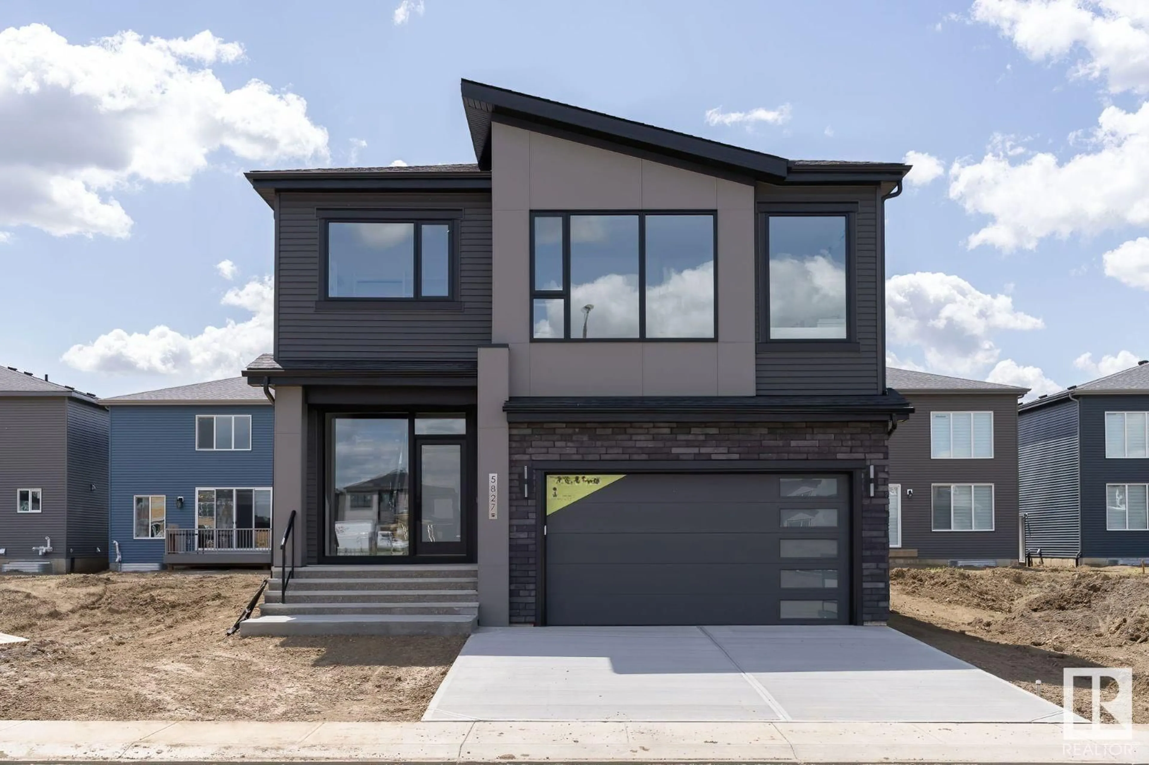 Home with brick exterior material, street for SW - 5827 KOOTOOK LI, Edmonton Alberta T6W1A5