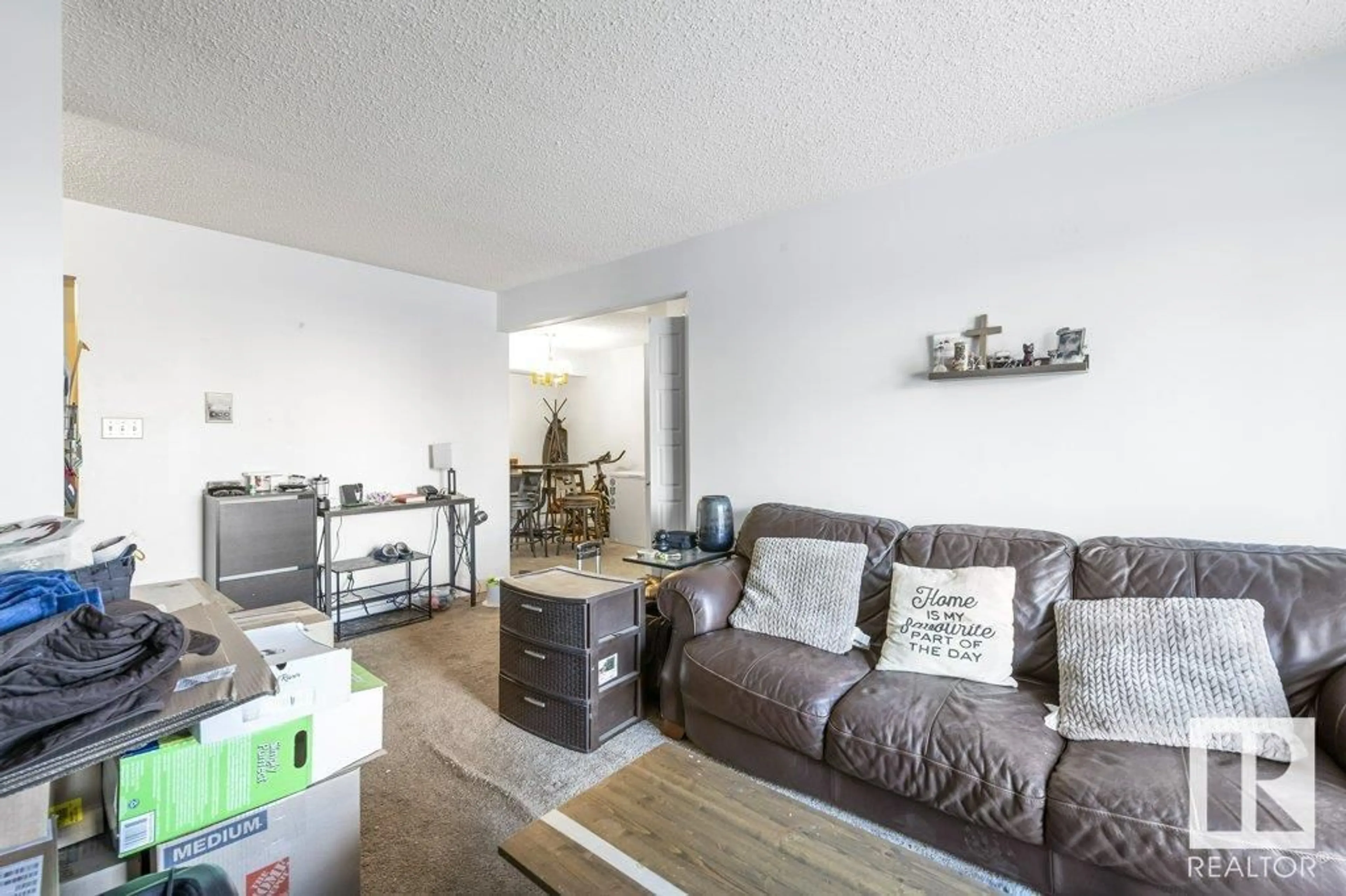 Living room with furniture, wood/laminate floor for 8024 TUDOR GL, St. Albert Alberta T8N3V4