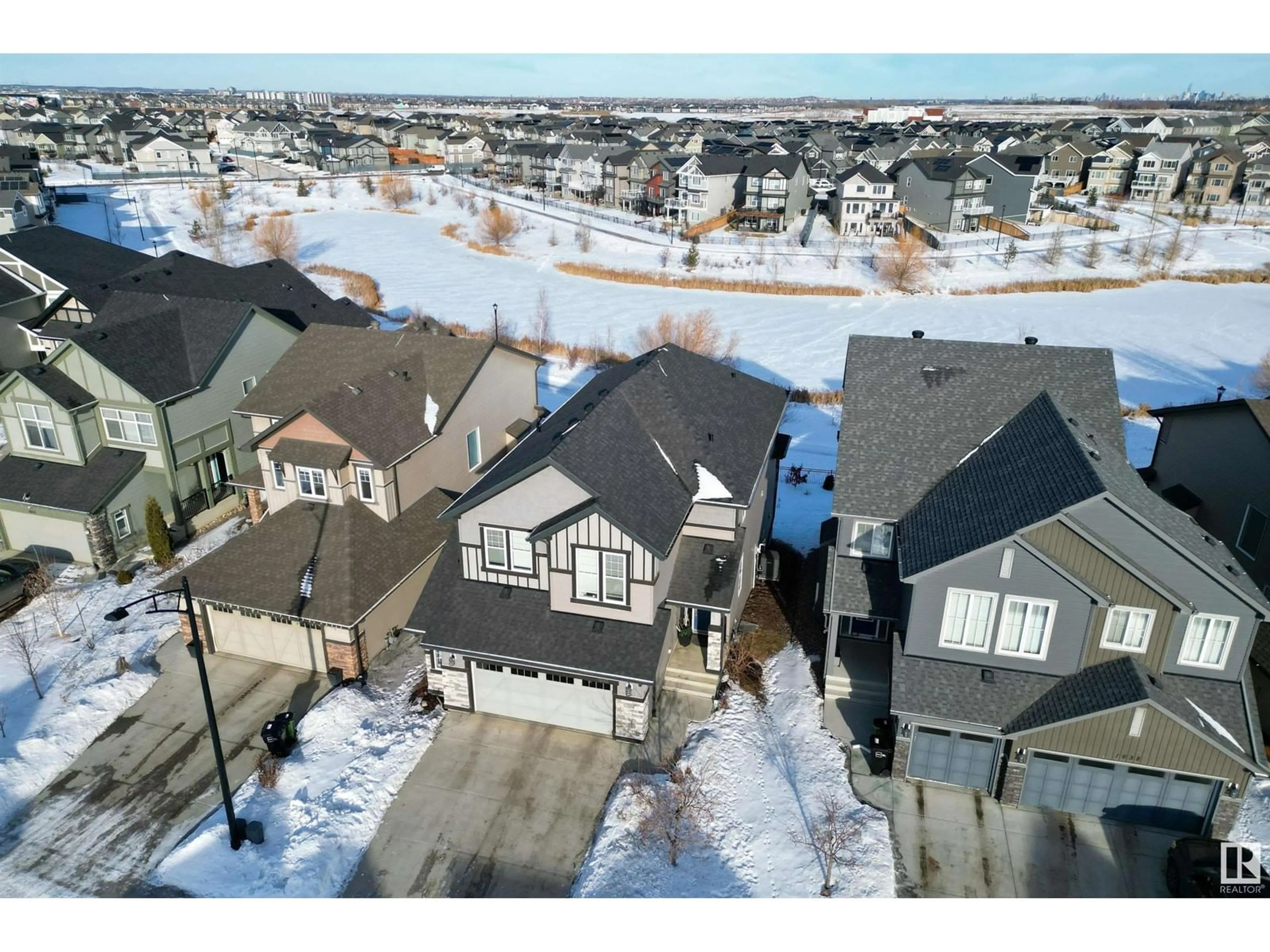 A pic from outside/outdoor area/front of a property/back of a property/a pic from drone, street for 1640 DAVIDSON GR SW, Edmonton Alberta T6W3J3