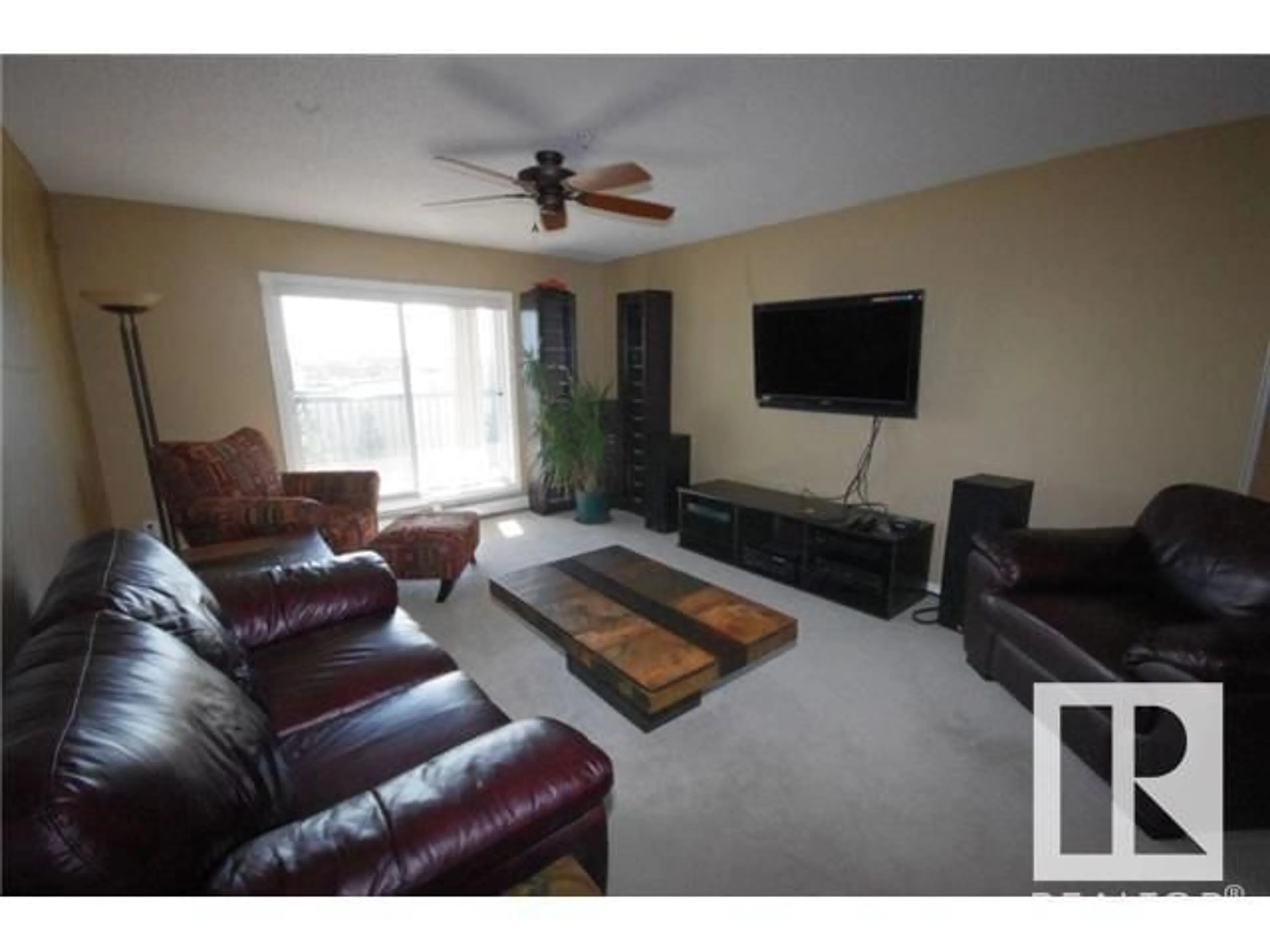 Living room with furniture, unknown for 2436 - 343 GUARDIAN RD, Edmonton Alberta T5T2P5