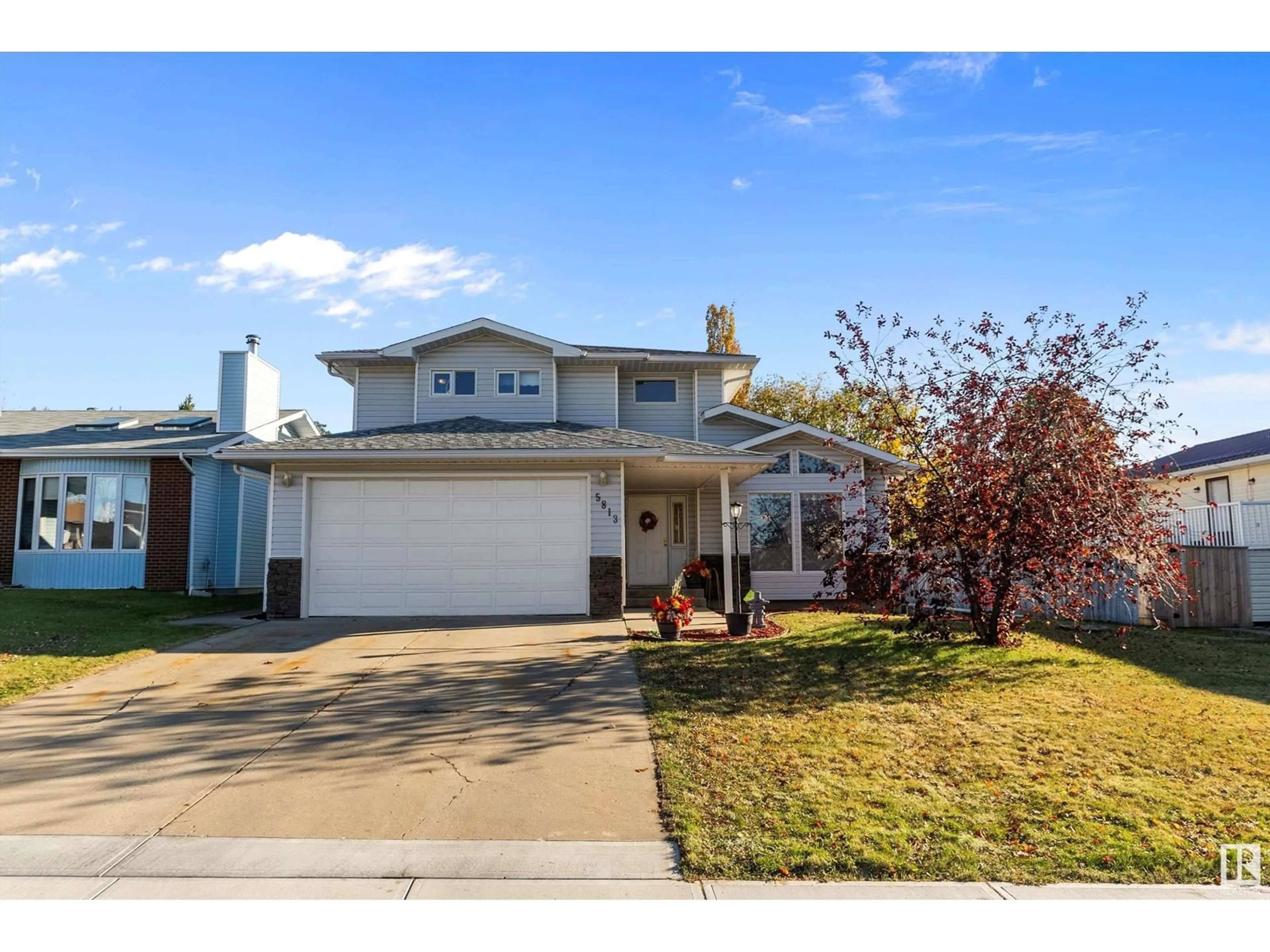 Home with vinyl exterior material, street for 5813 56 ST, Barrhead Alberta T7N1C8