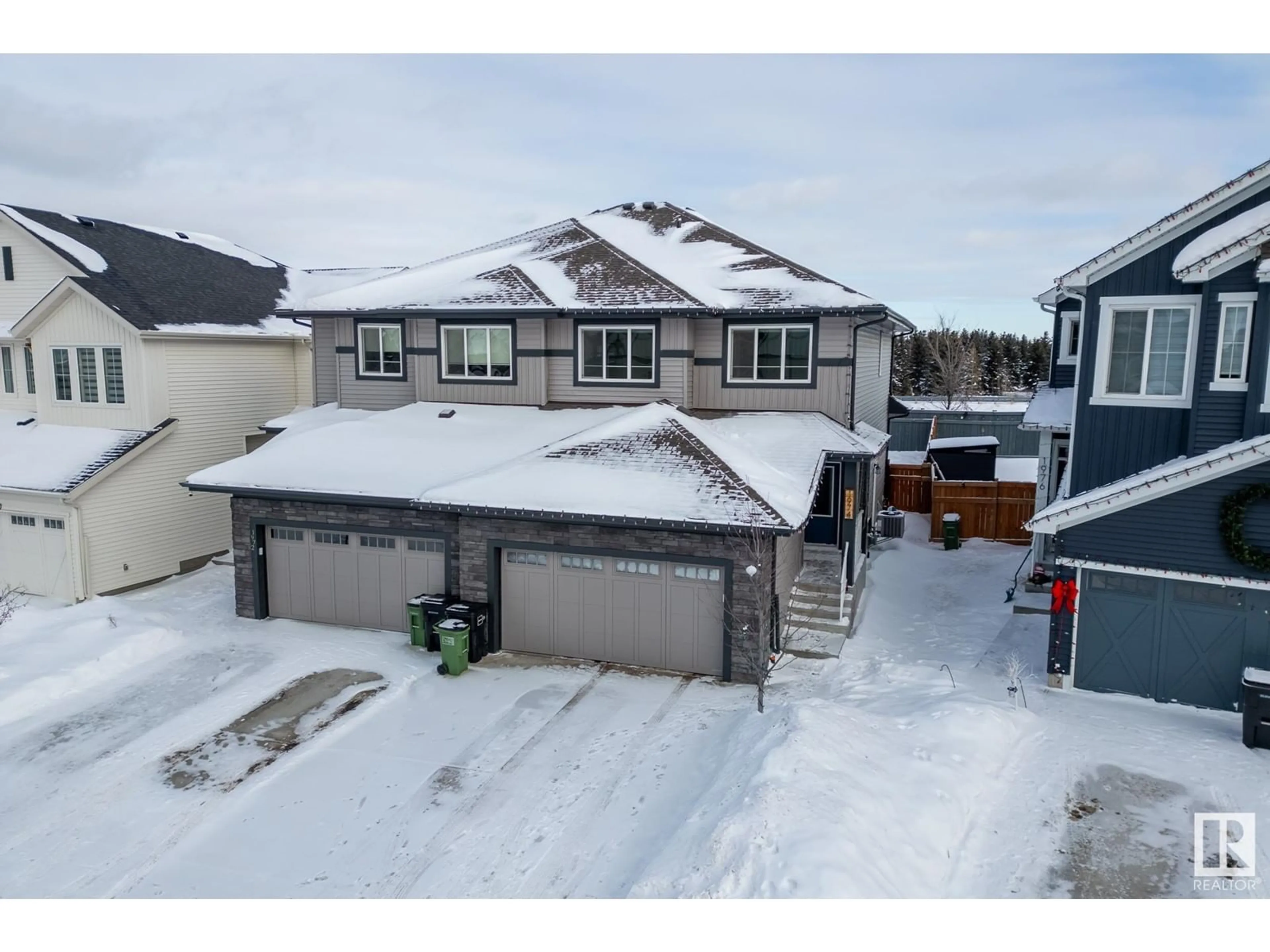 A pic from outside/outdoor area/front of a property/back of a property/a pic from drone, street for 1974 KROETSCH CR SW, Edmonton Alberta T6W4J3