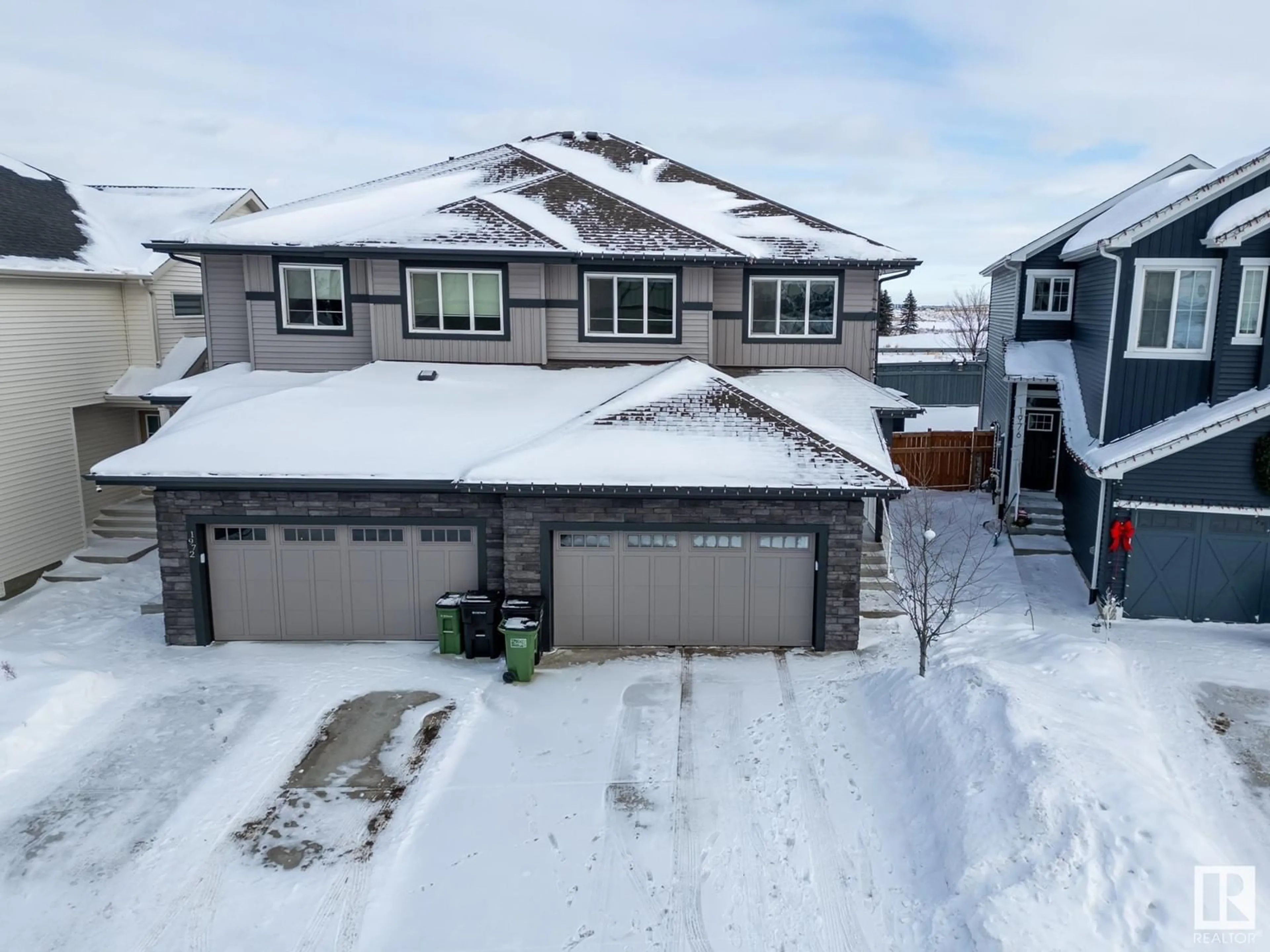 A pic from outside/outdoor area/front of a property/back of a property/a pic from drone, street for 1974 KROETSCH CR SW, Edmonton Alberta T6W4J3