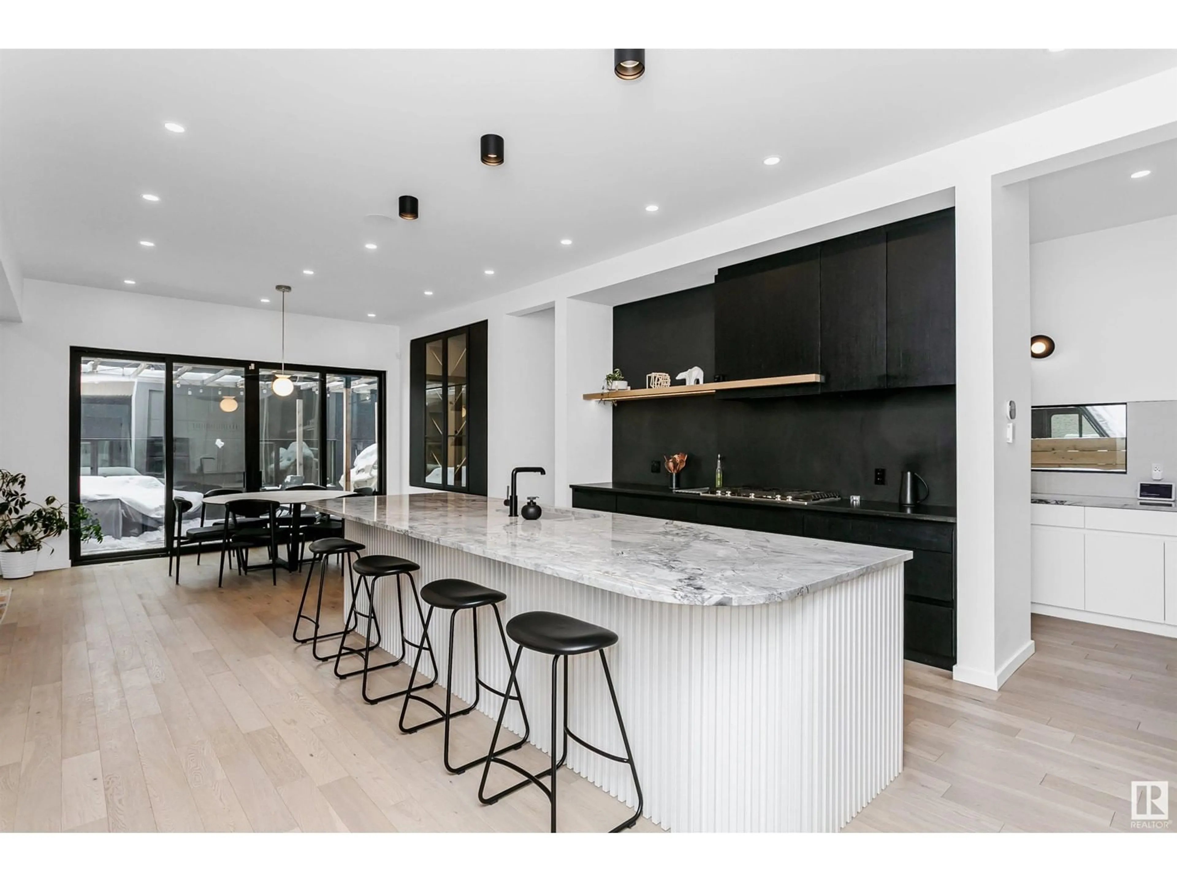 Open concept kitchen, ceramic/tile floor for 9952 82 ST, Edmonton Alberta T6A3L8