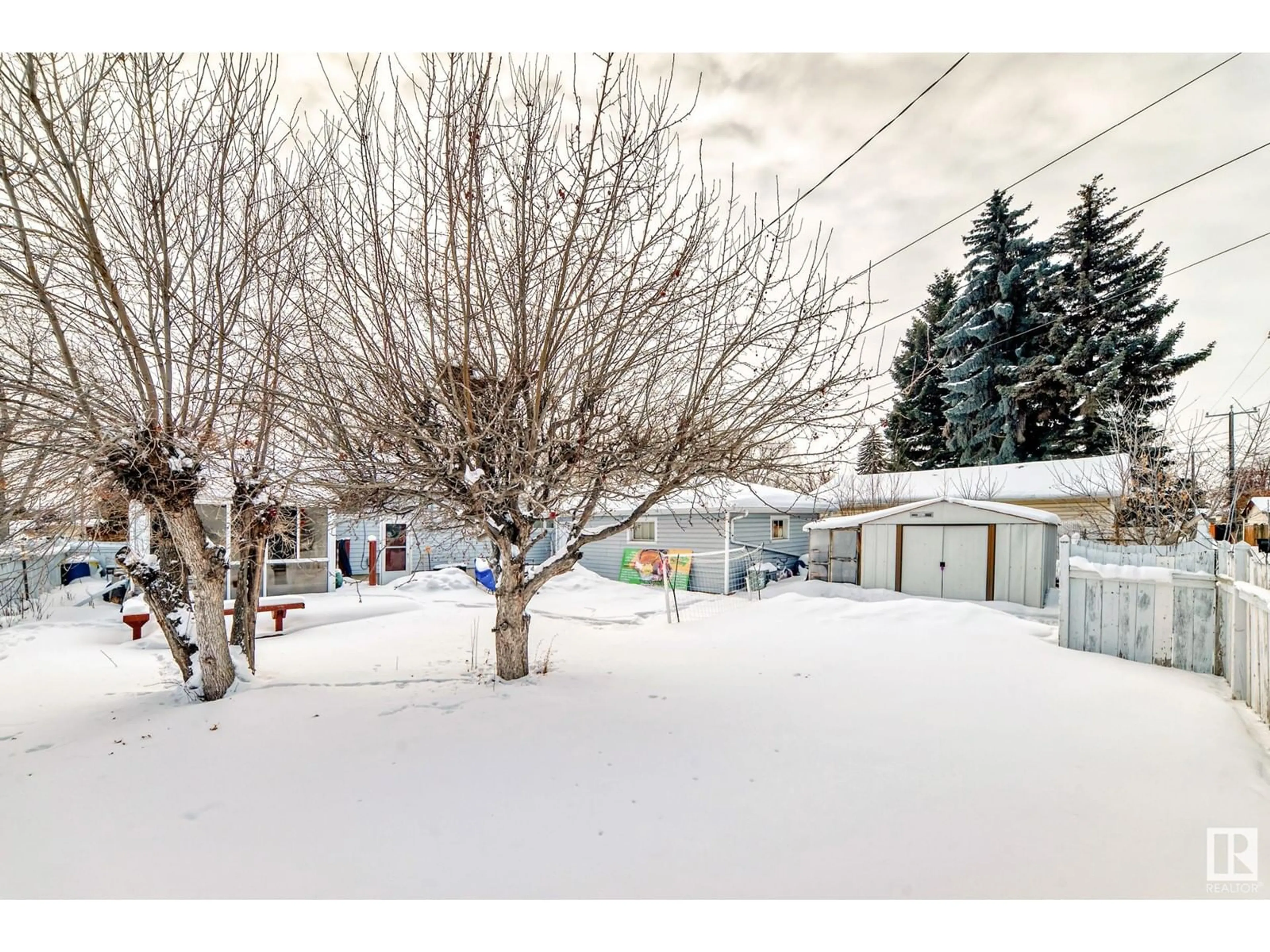 A pic from outside/outdoor area/front of a property/back of a property/a pic from drone, street for 15606 92 AV NW, Edmonton Alberta T5R5C4