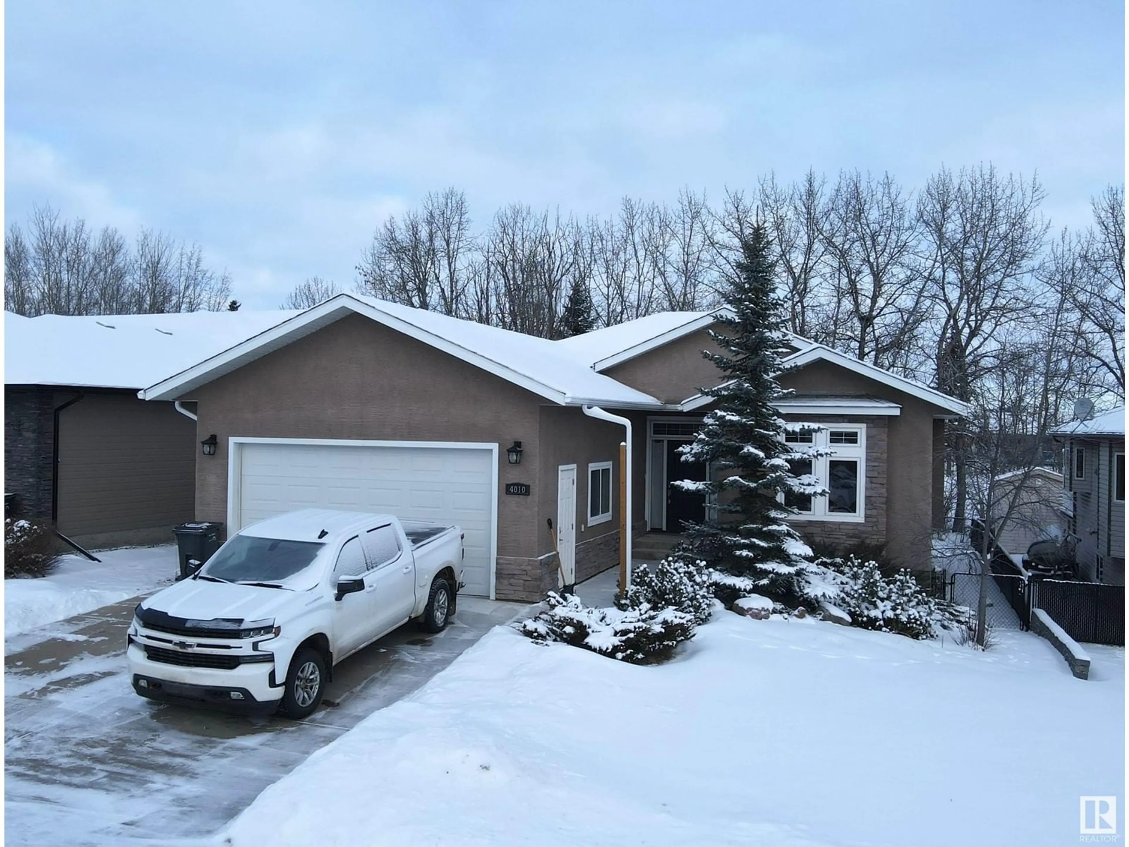 A pic from outside/outdoor area/front of a property/back of a property/a pic from drone, street for 4010 47 AV, Drayton Valley Alberta T7A0A8