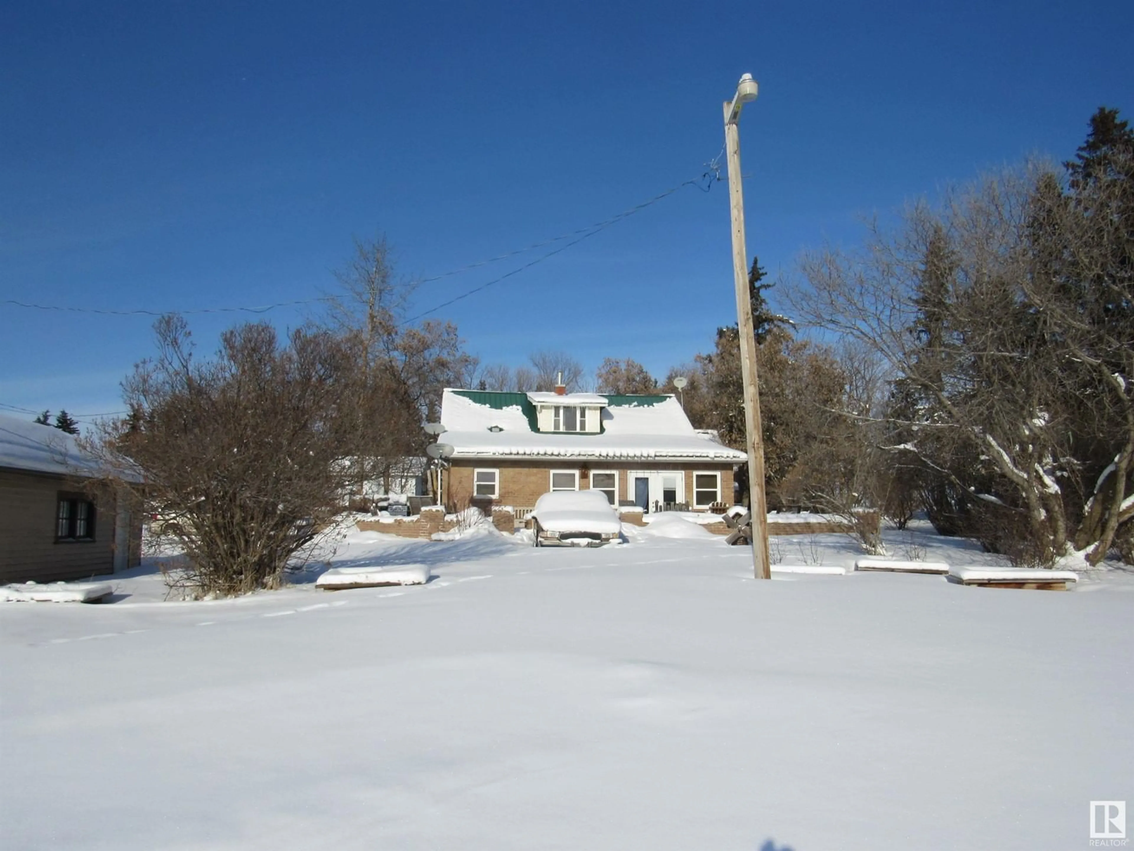 A pic from outside/outdoor area/front of a property/back of a property/a pic from drone, unknown for 60006 RR 34, Rural Barrhead County Alberta T7N1N3