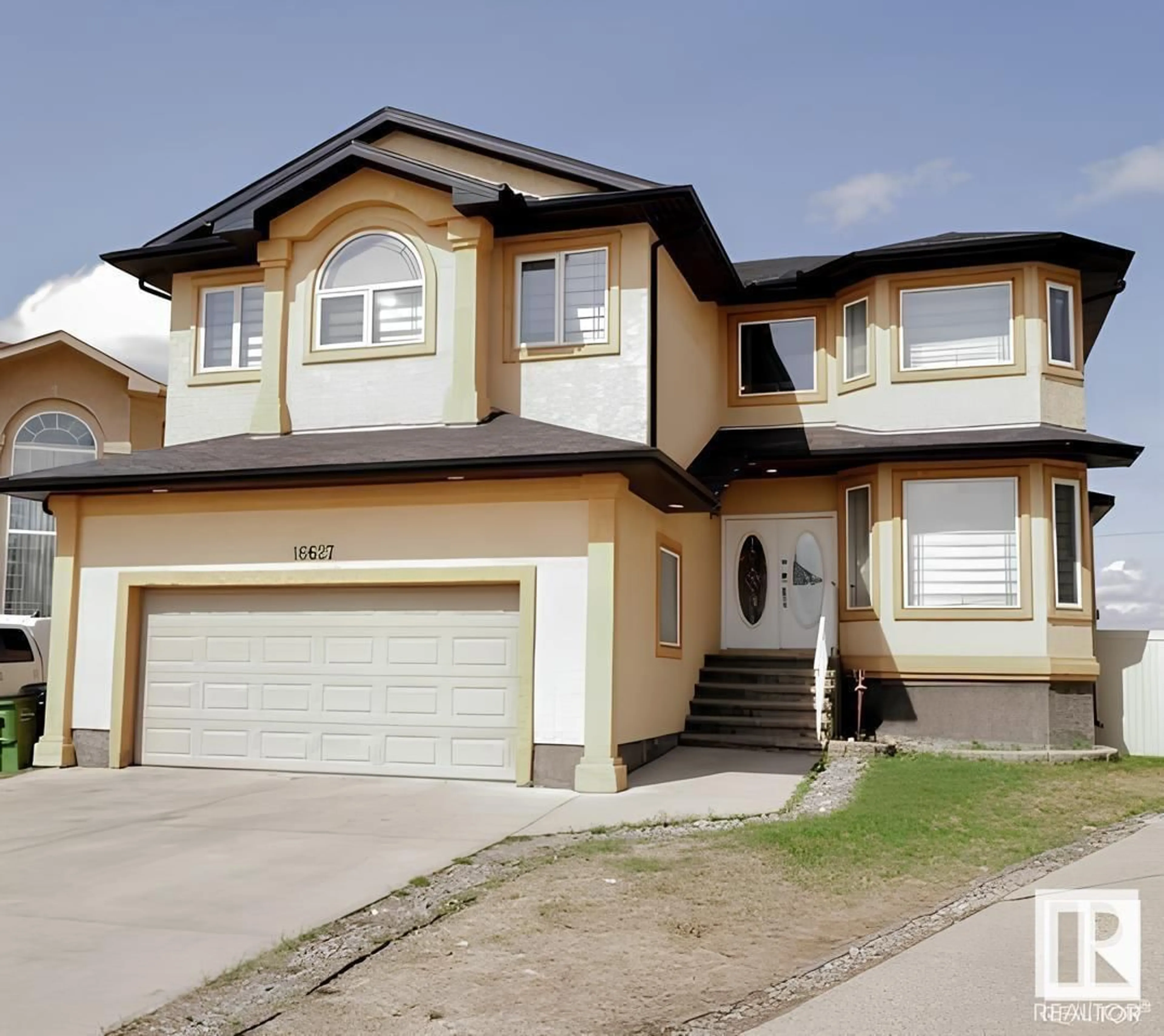 Home with vinyl exterior material, street for 16627 70 ST NW, Edmonton Alberta T5Z3J8