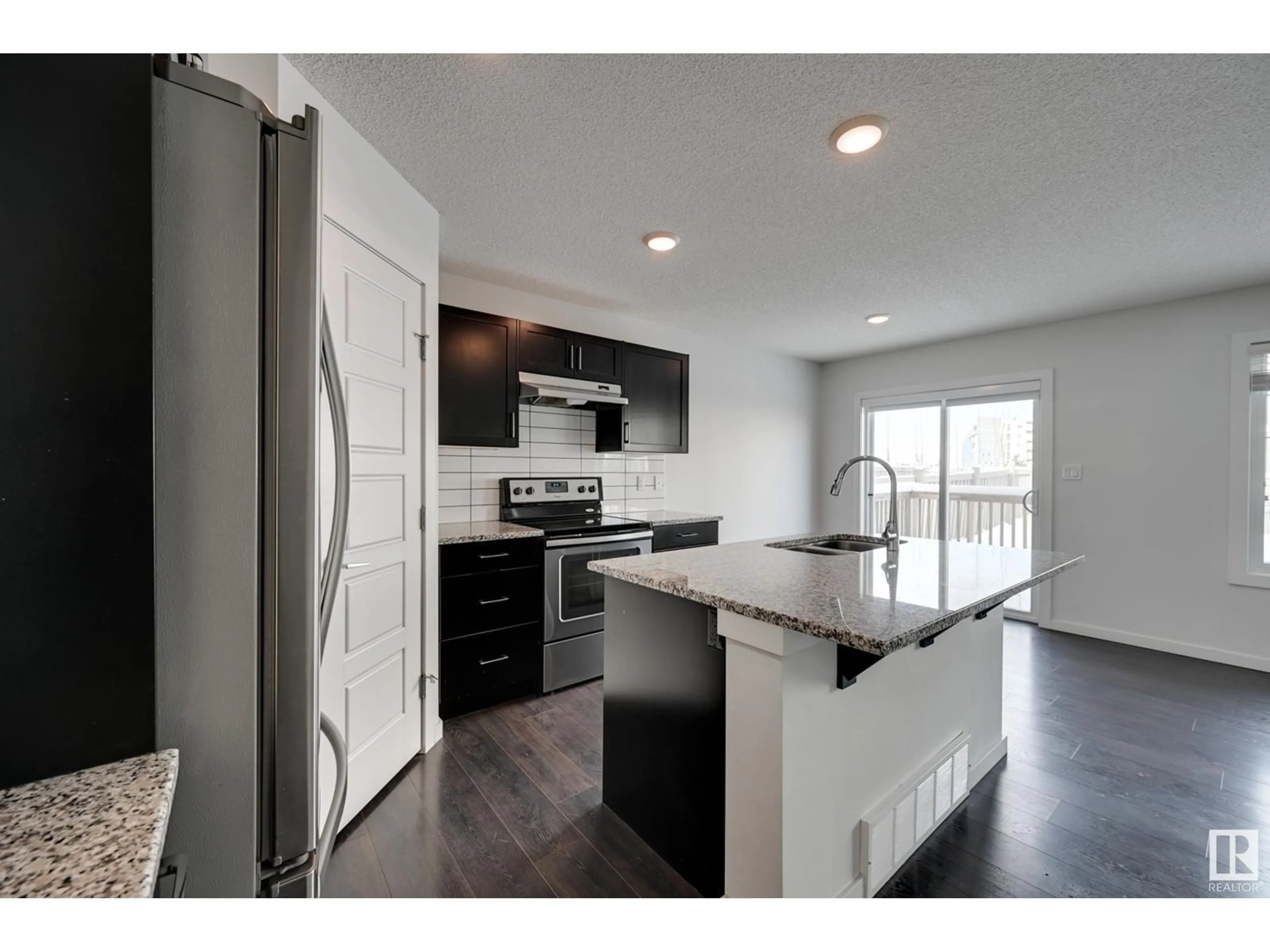 Open concept kitchen, unknown for 21942 91 AV NW, Edmonton Alberta T5T6Z8