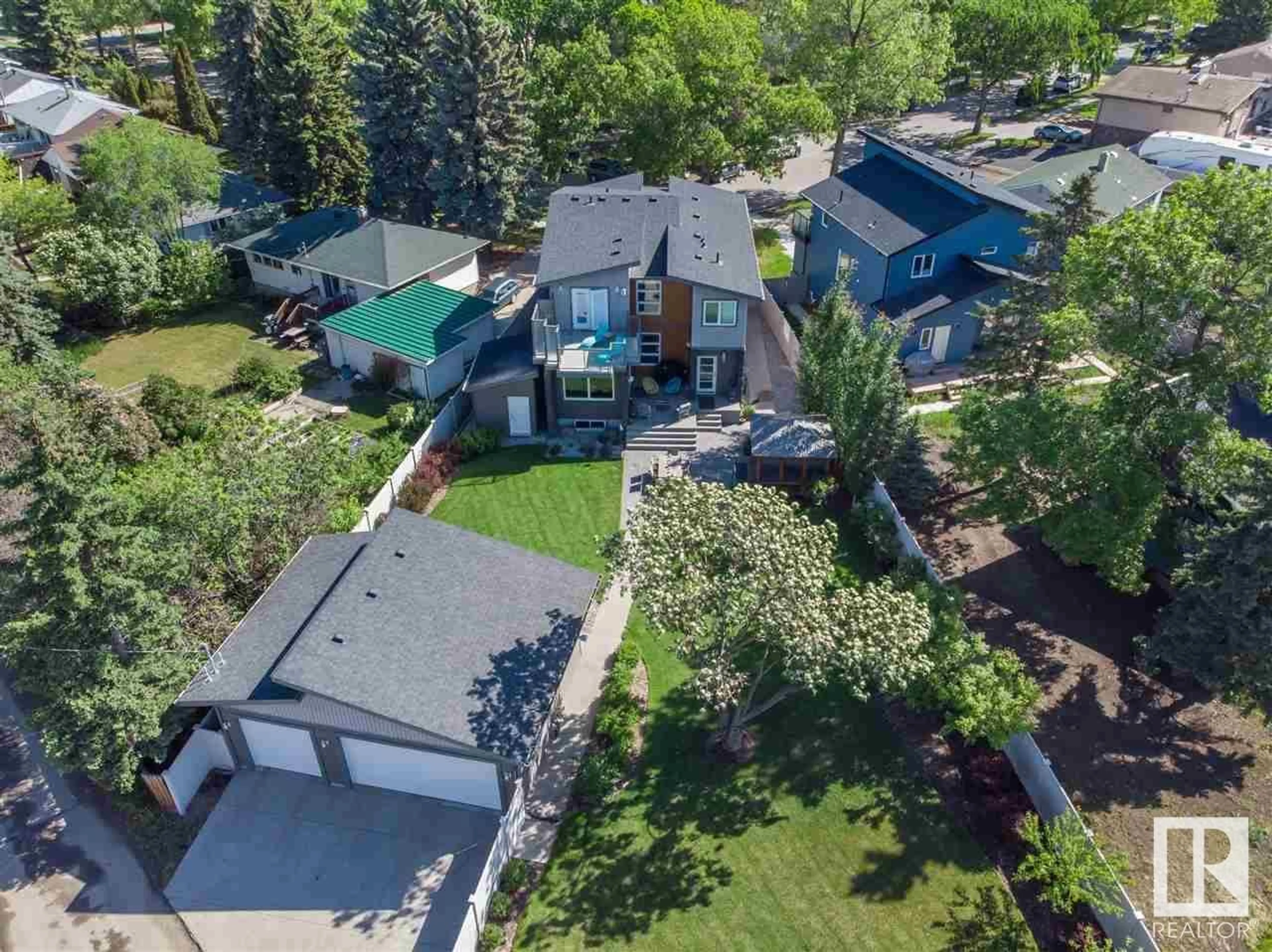 A pic from outside/outdoor area/front of a property/back of a property/a pic from drone, street for 9104 83 ST NW, Edmonton Alberta T6C2Z4