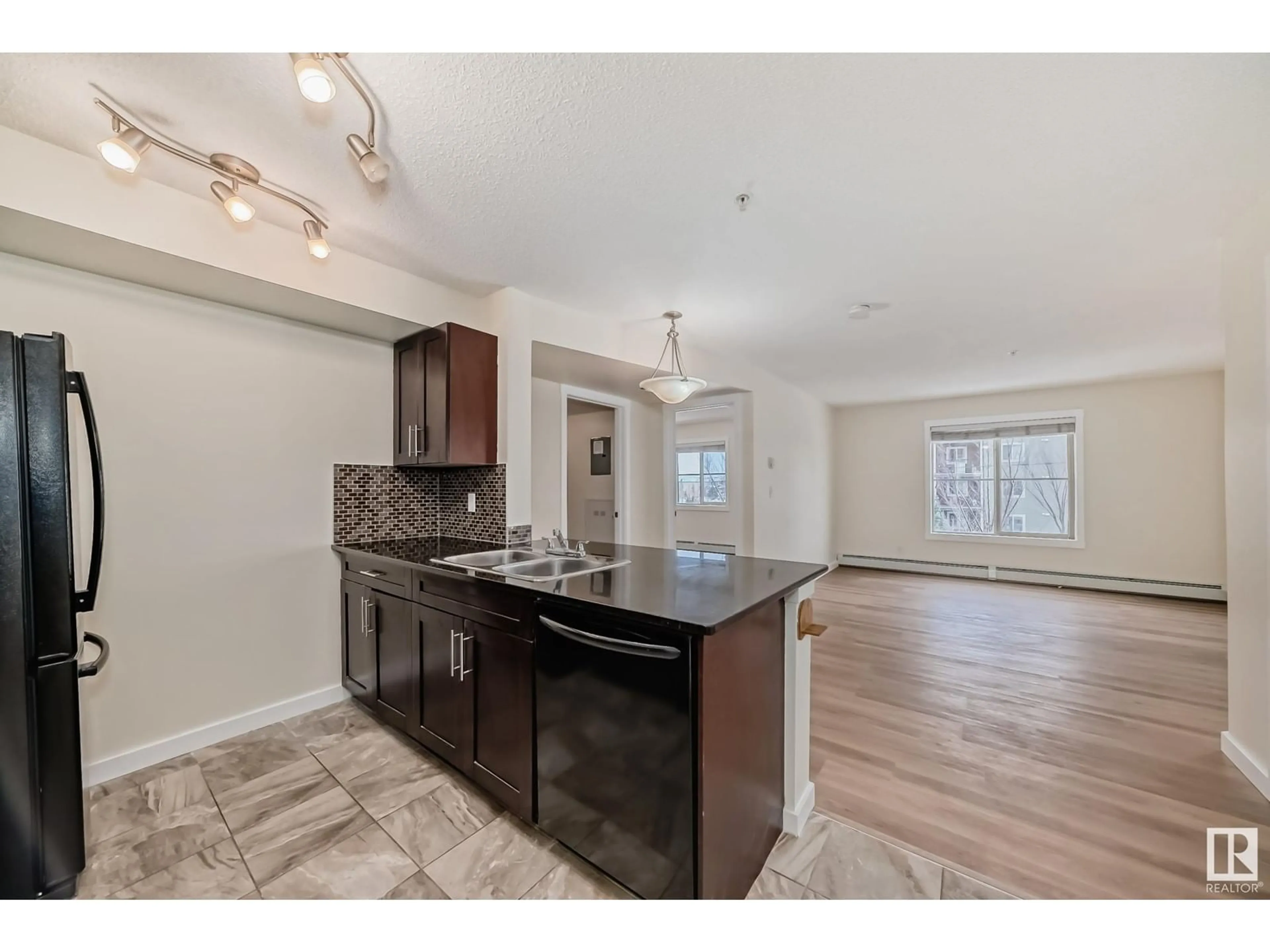 Open concept kitchen, unknown for 207 - 5370 CHAPPELLE RD, Edmonton Alberta T6W3L5