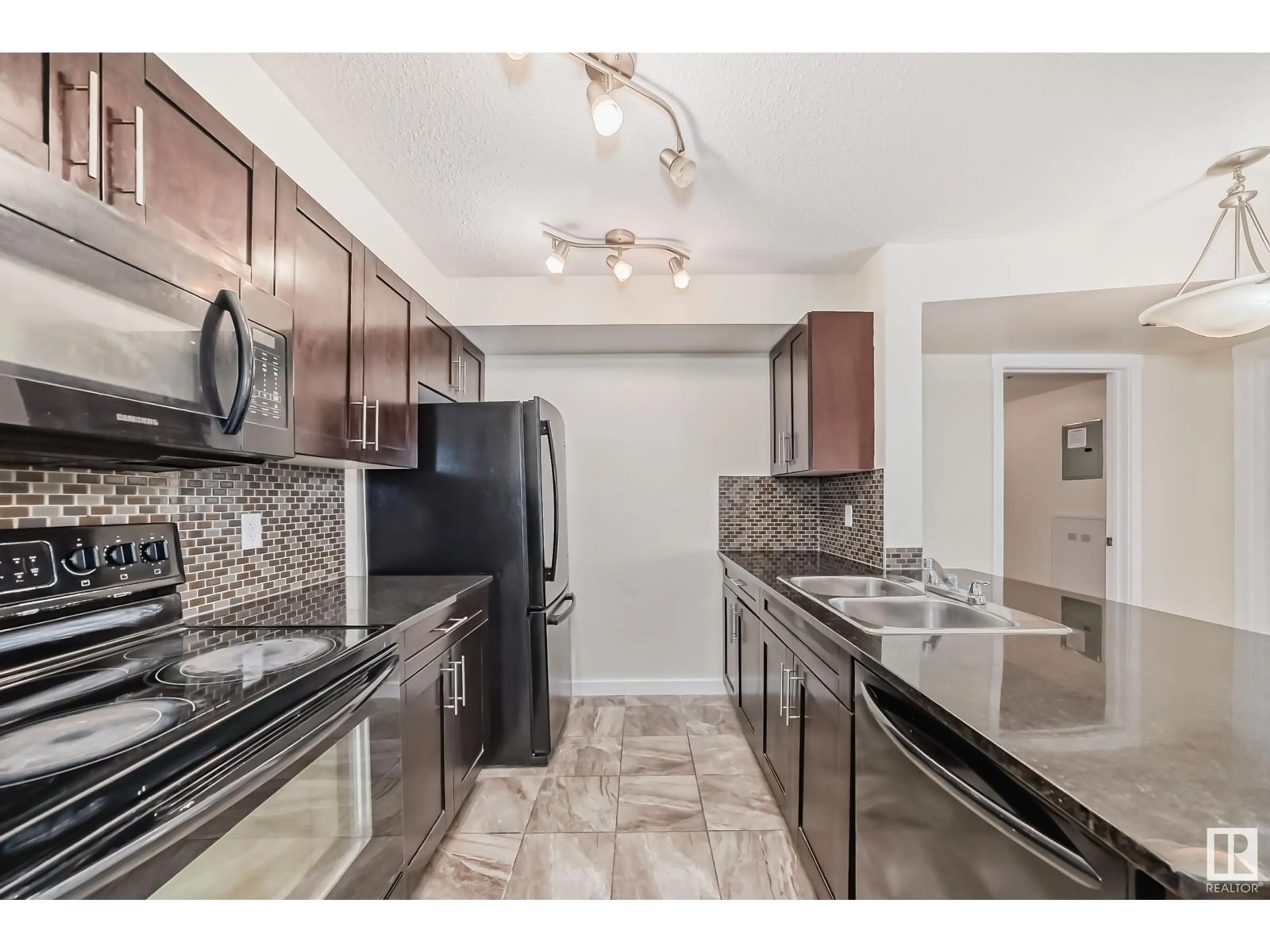 Standard kitchen, ceramic/tile floor for #207 5370 CHAPPELLE RD SW, Edmonton Alberta T6W3L5