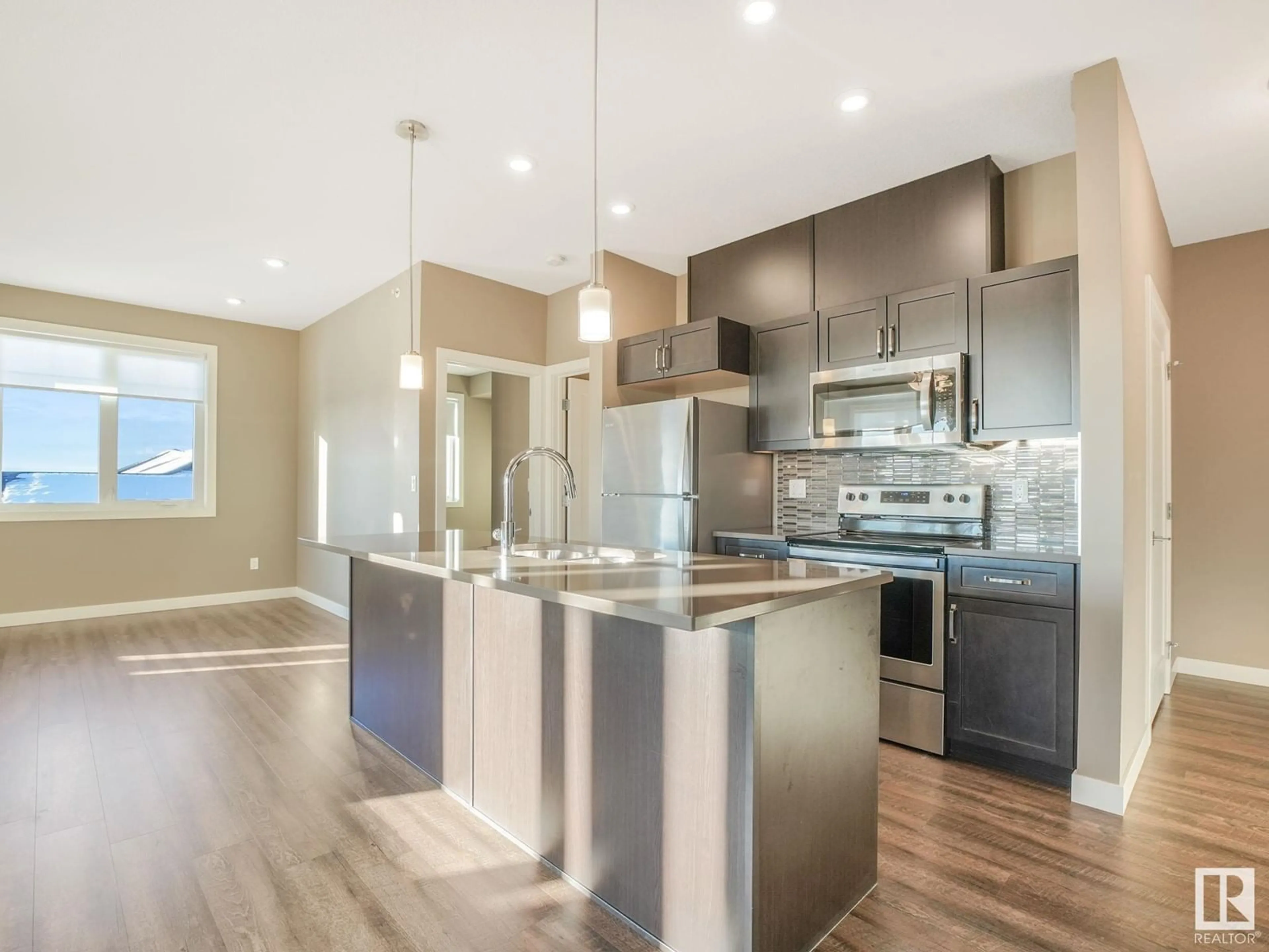 Open concept kitchen, unknown for #402 1027 173 ST SW, Edmonton Alberta T6W3E4