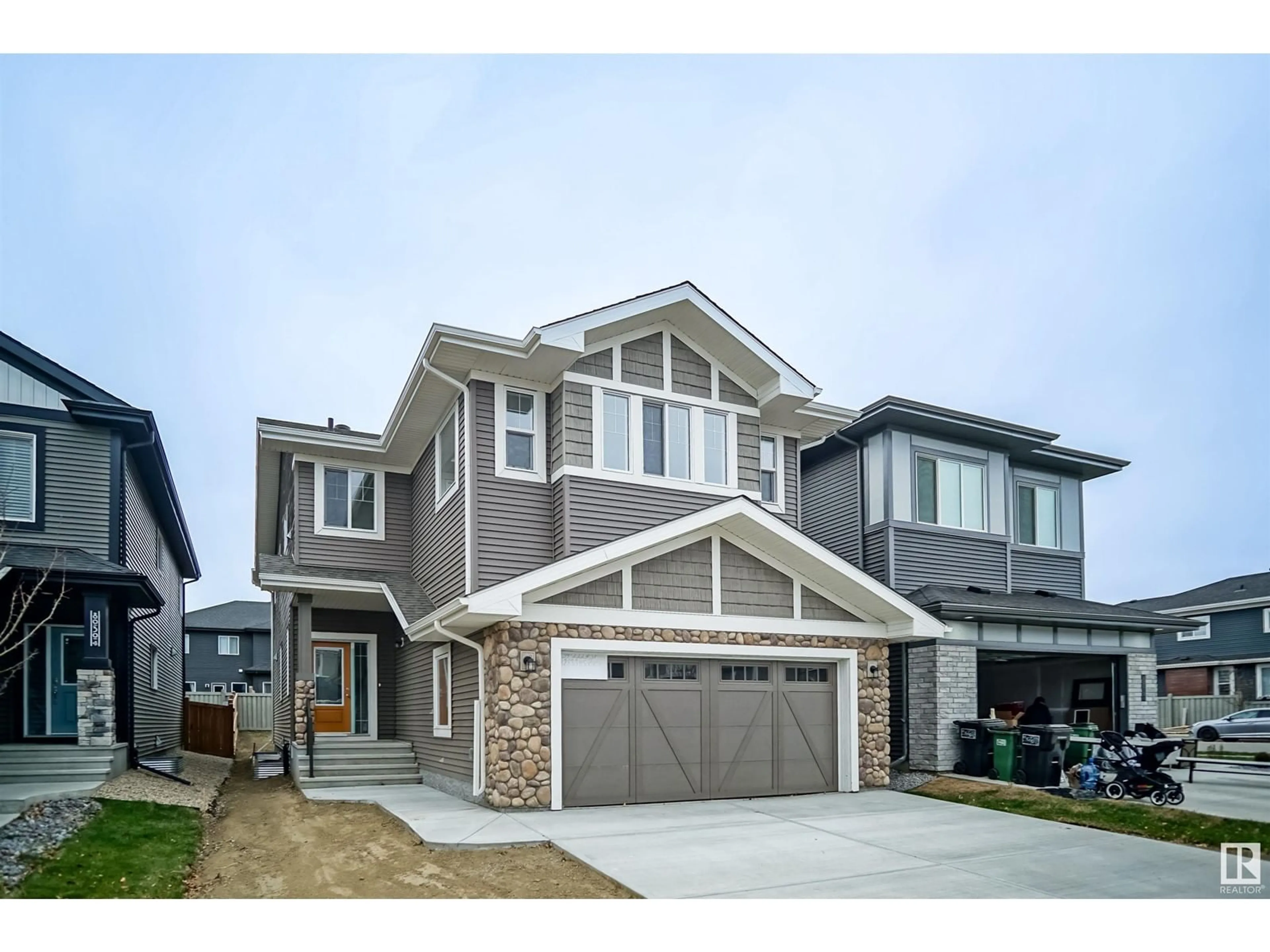 Home with vinyl exterior material, street for 1720 WESTERRA WD, Stony Plain Alberta T7Z0M1