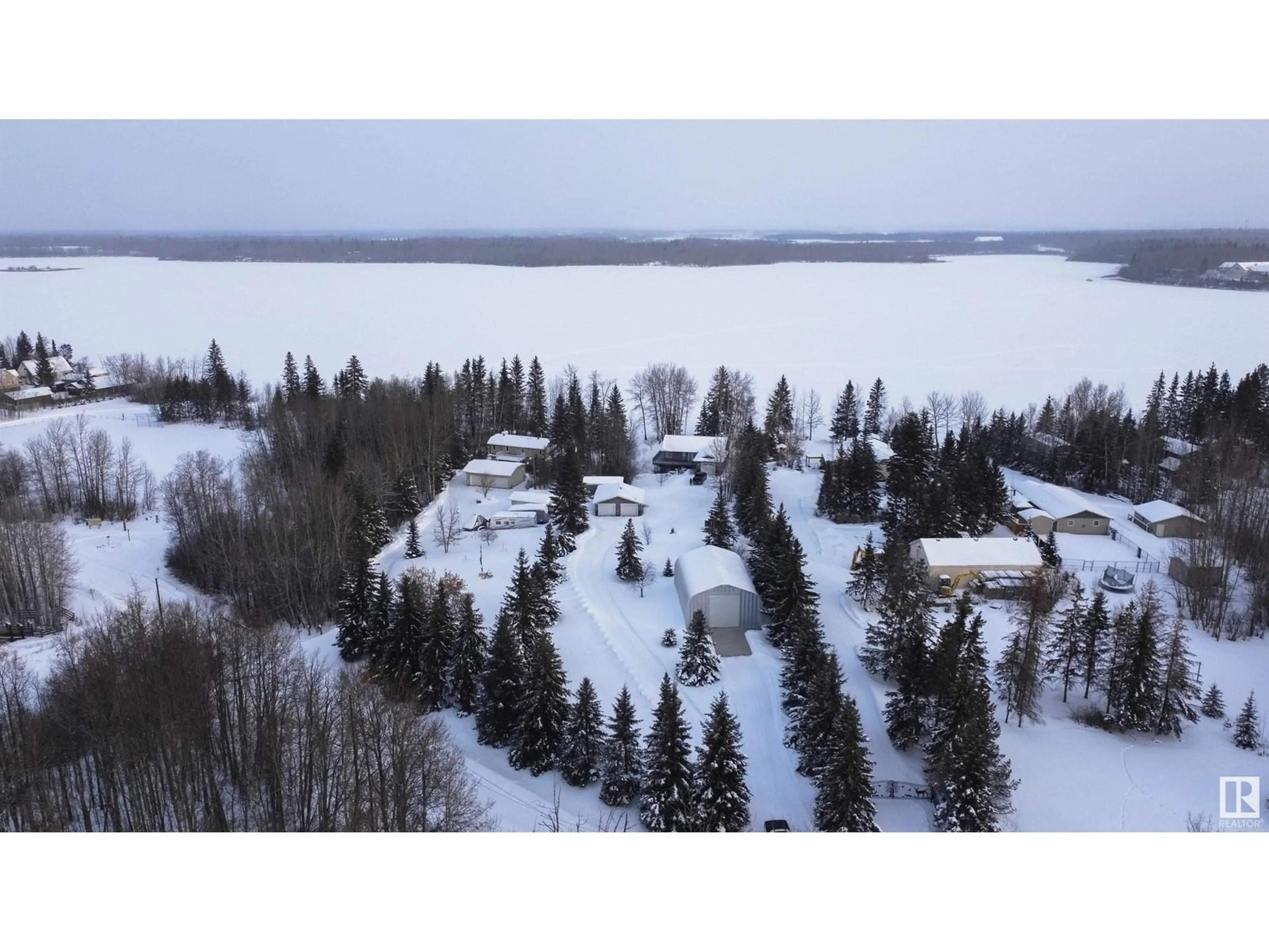 A pic from outside/outdoor area/front of a property/back of a property/a pic from drone, water/lake/river/ocean view for 5551B Nakamun DR, Rural Lac Ste. Anne County Alberta T0E1V0