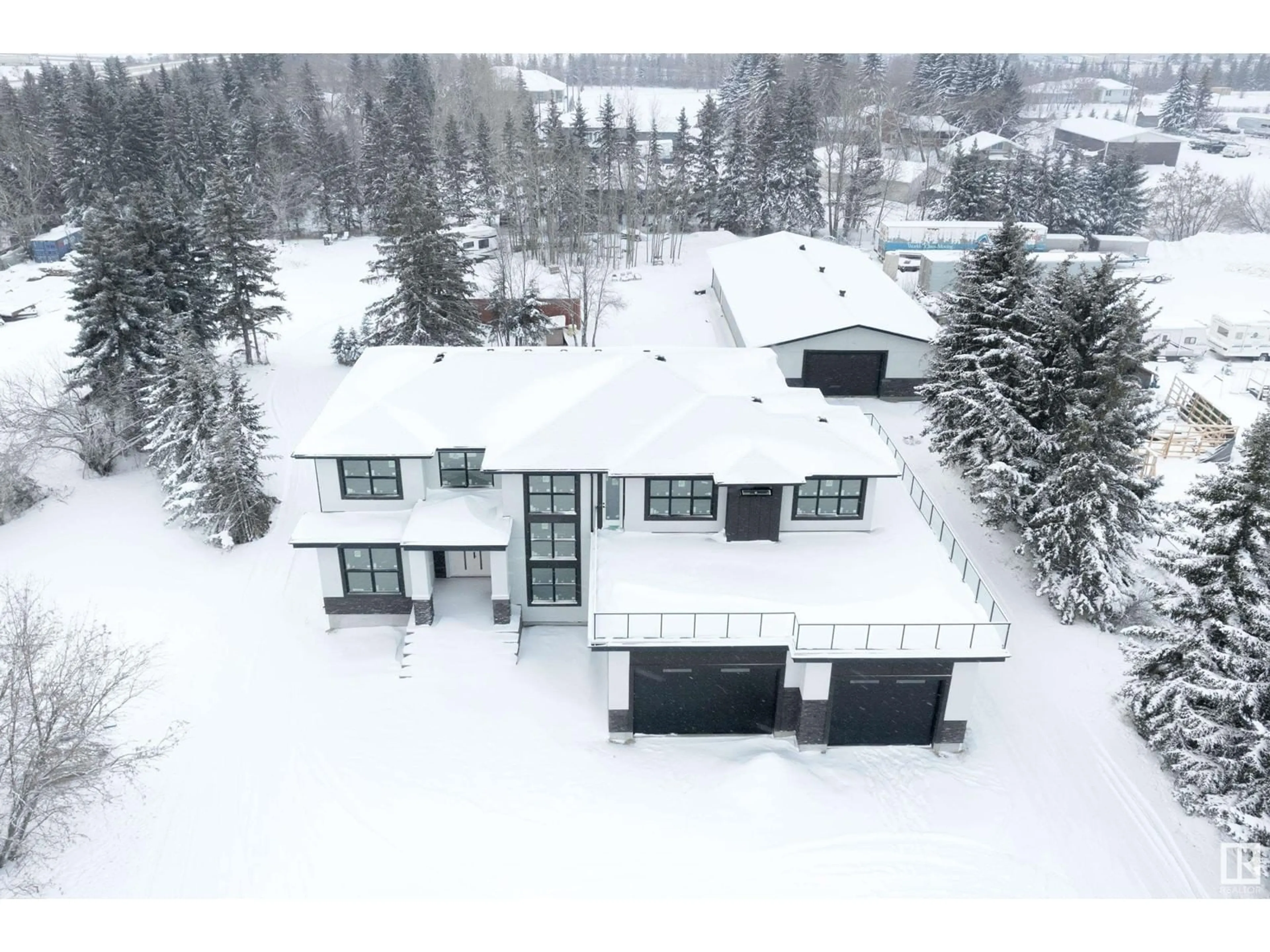 A pic from outside/outdoor area/front of a property/back of a property/a pic from drone, building for 18445 122 AV NW, Edmonton Alberta T5V1R4