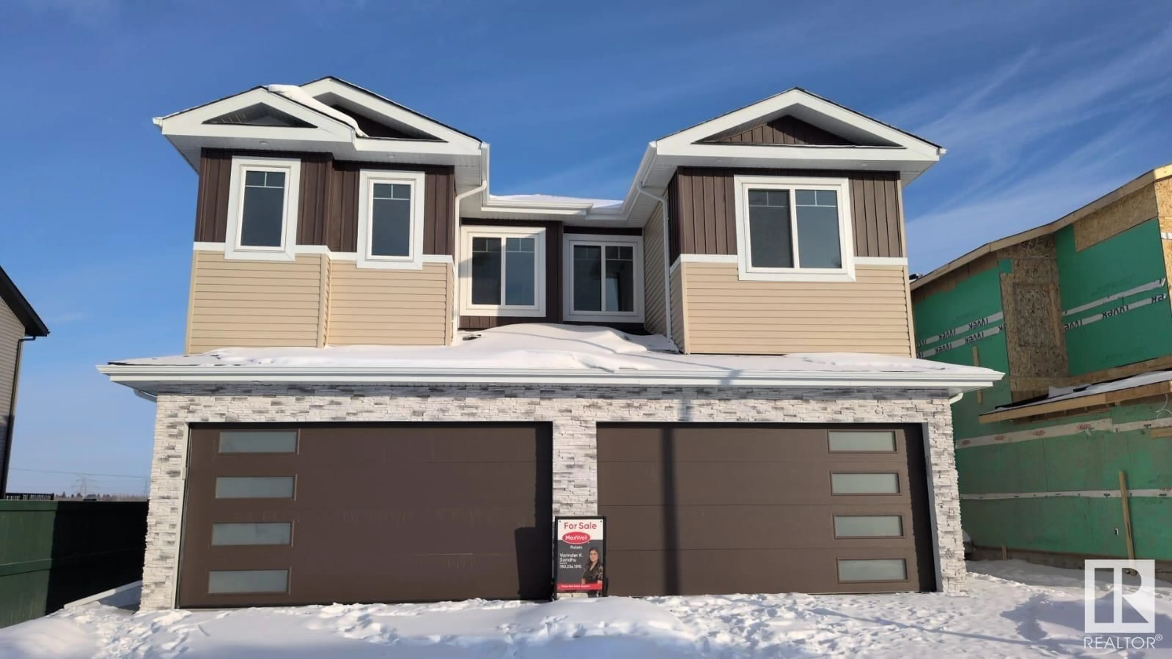 Home with vinyl exterior material, street for 1918 155 AV NW, Edmonton Alberta T5Y4H8