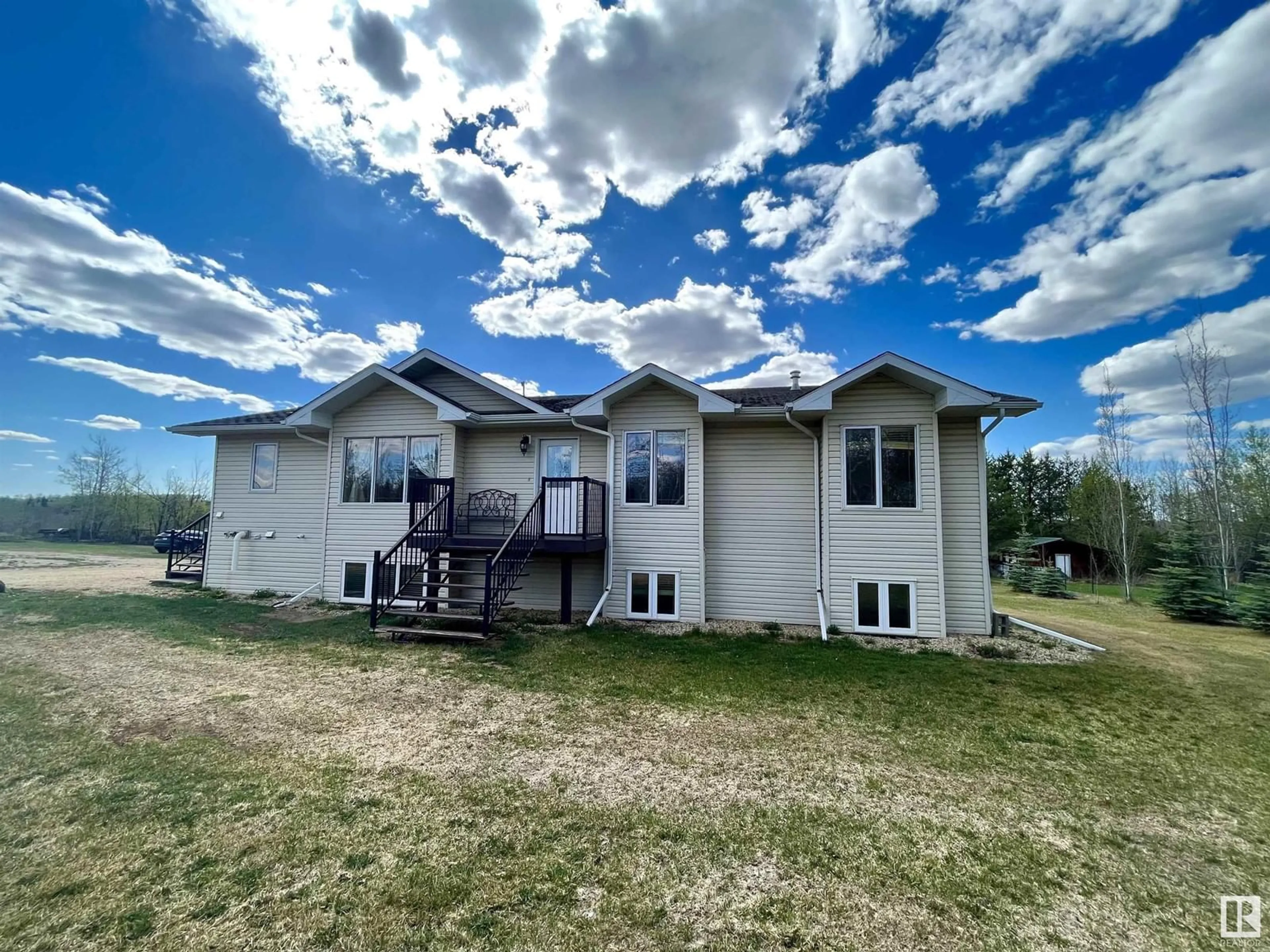 A pic from outside/outdoor area/front of a property/back of a property/a pic from drone, unknown for 32 23329 SH 651, Rural Sturgeon County Alberta T0A1N6
