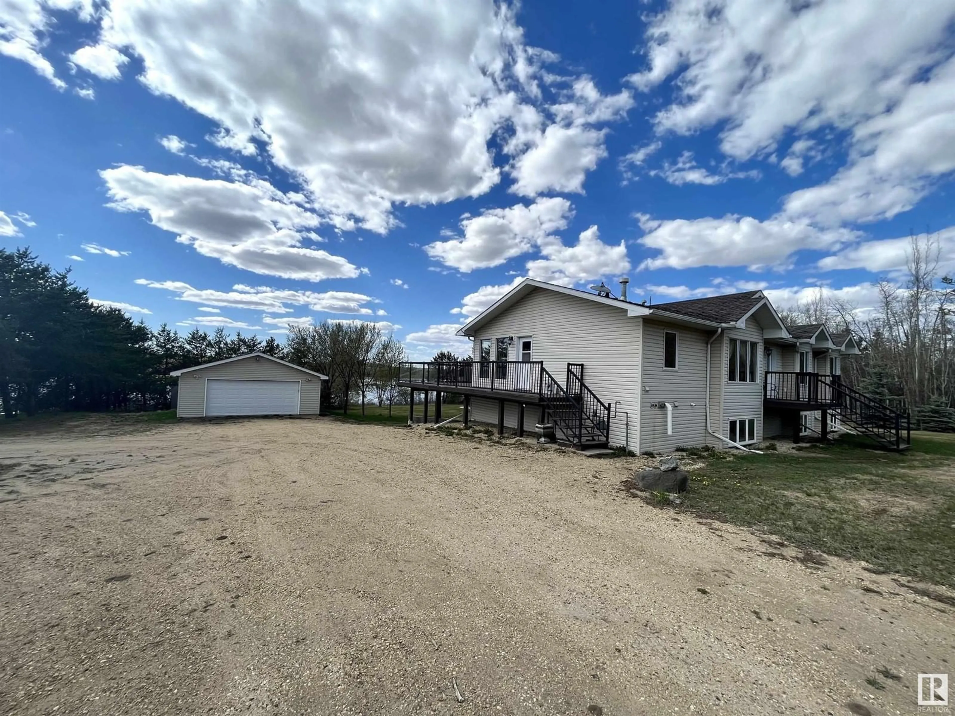 A pic from outside/outdoor area/front of a property/back of a property/a pic from drone, unknown for 32 23329 SH 651, Rural Sturgeon County Alberta T0A1N6