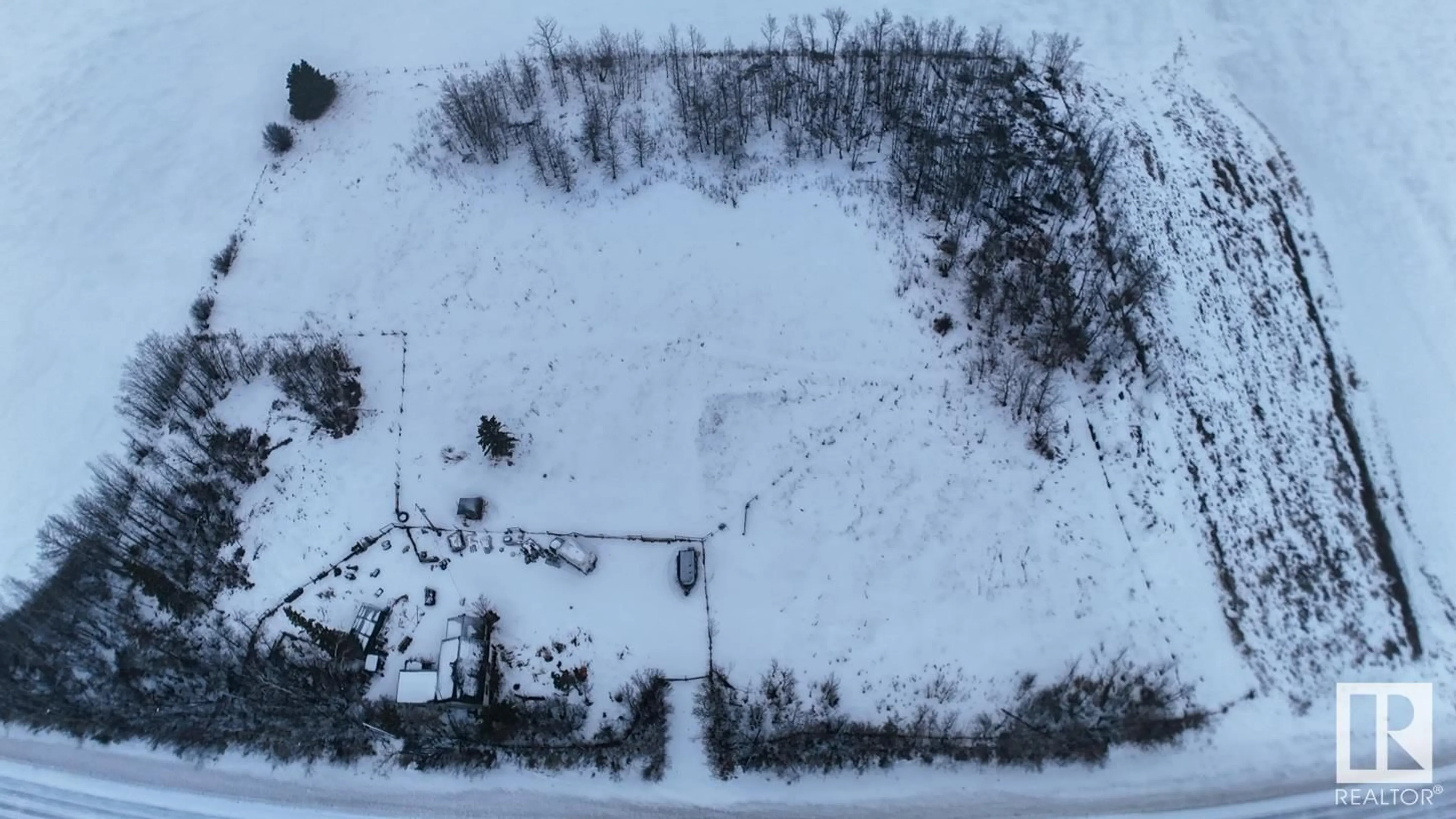 A pic from outside/outdoor area/front of a property/back of a property/a pic from drone, street for 26027 SH 651, Rural Sturgeon County Alberta T0G0B1