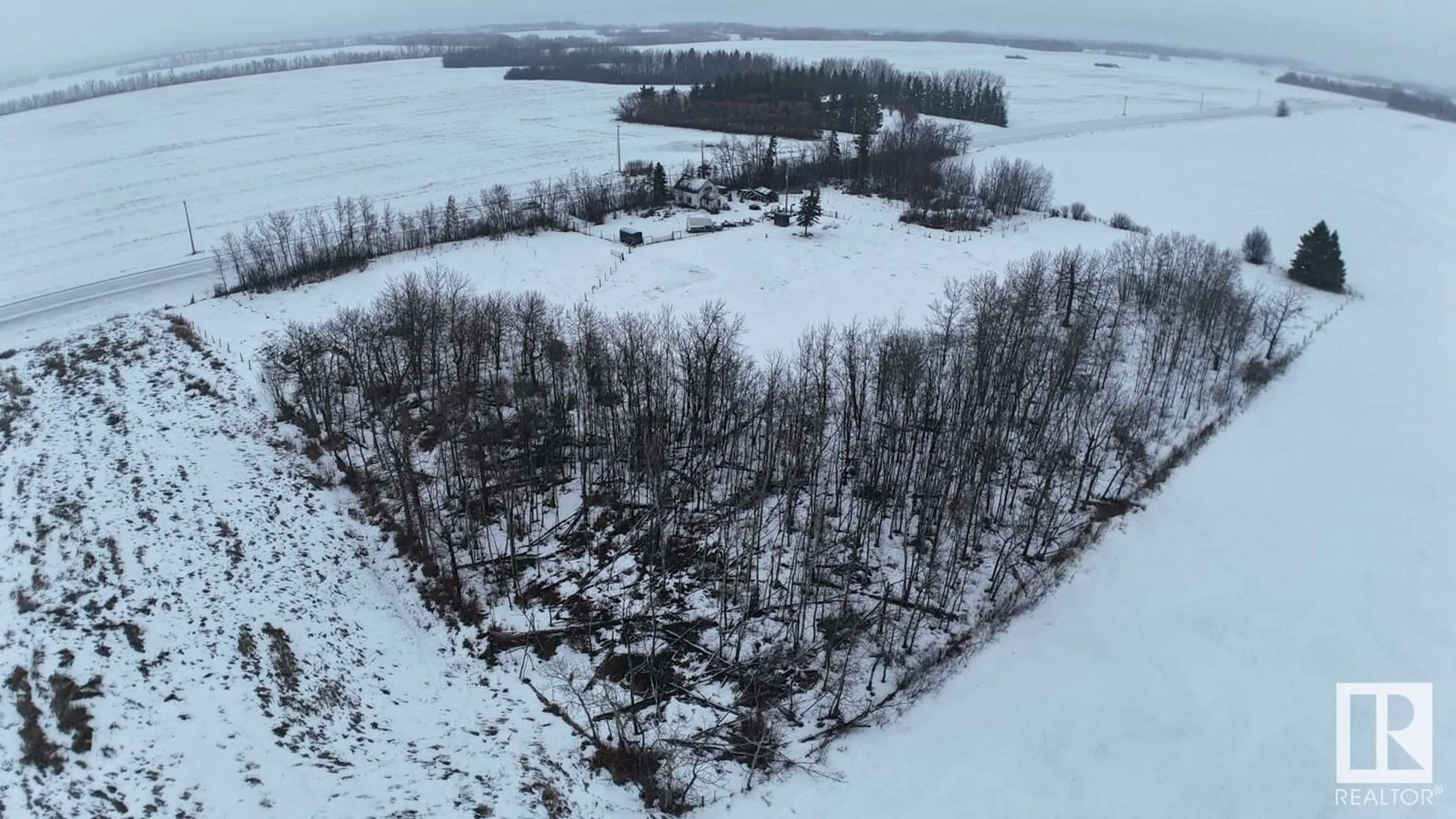 A pic from outside/outdoor area/front of a property/back of a property/a pic from drone, forest/trees view for 26027 SH 651, Rural Sturgeon County Alberta T0G0B1