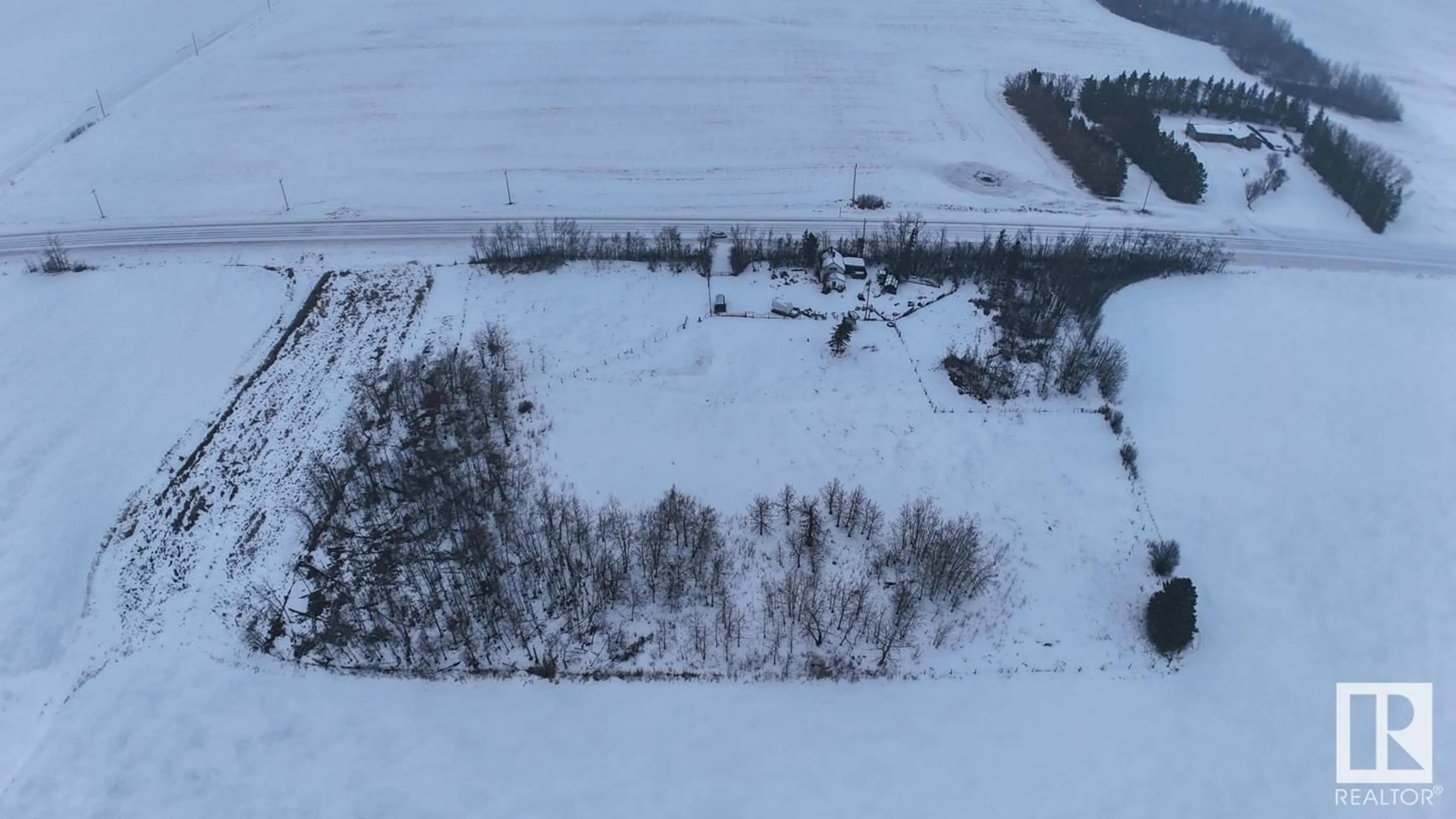 A pic from outside/outdoor area/front of a property/back of a property/a pic from drone, unknown for 26027 SH 651, Rural Sturgeon County Alberta T0G0B1