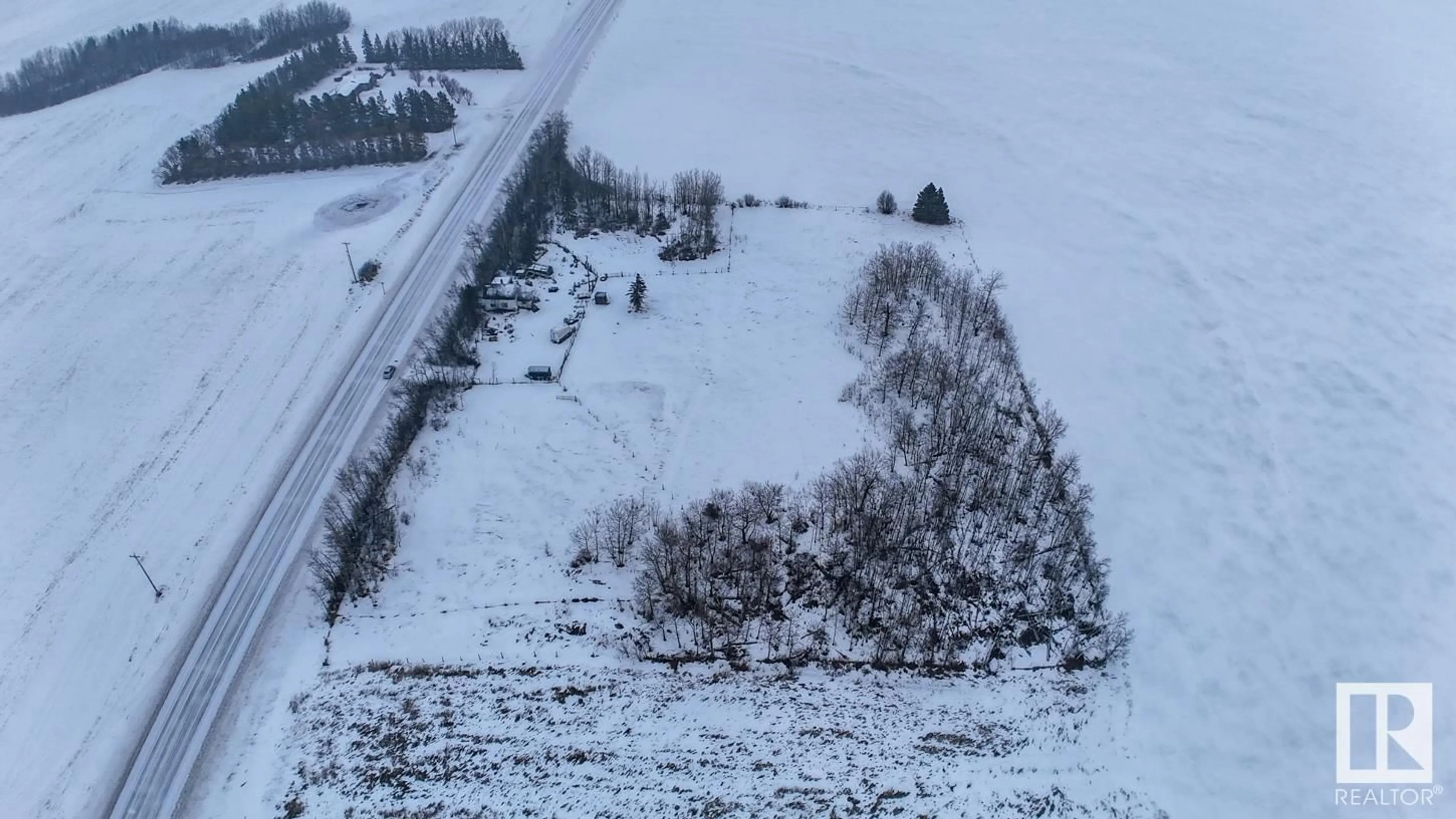 A pic from outside/outdoor area/front of a property/back of a property/a pic from drone, street for 26027 SH 651, Rural Sturgeon County Alberta T0G0B1