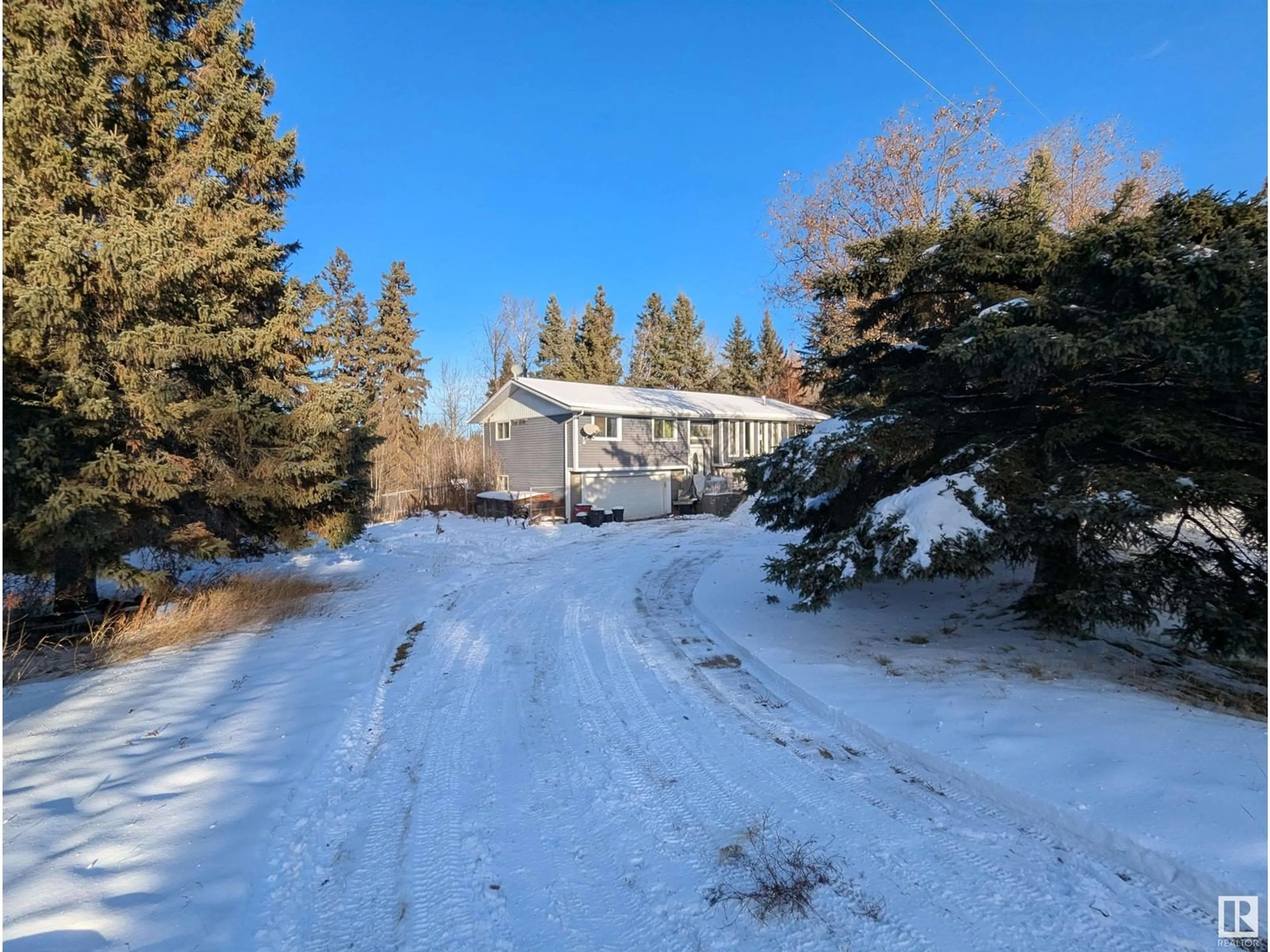 A pic from outside/outdoor area/front of a property/back of a property/a pic from drone, street for #2 52414 RGE ROAD 20, Rural Parkland County Alberta T0E0H0