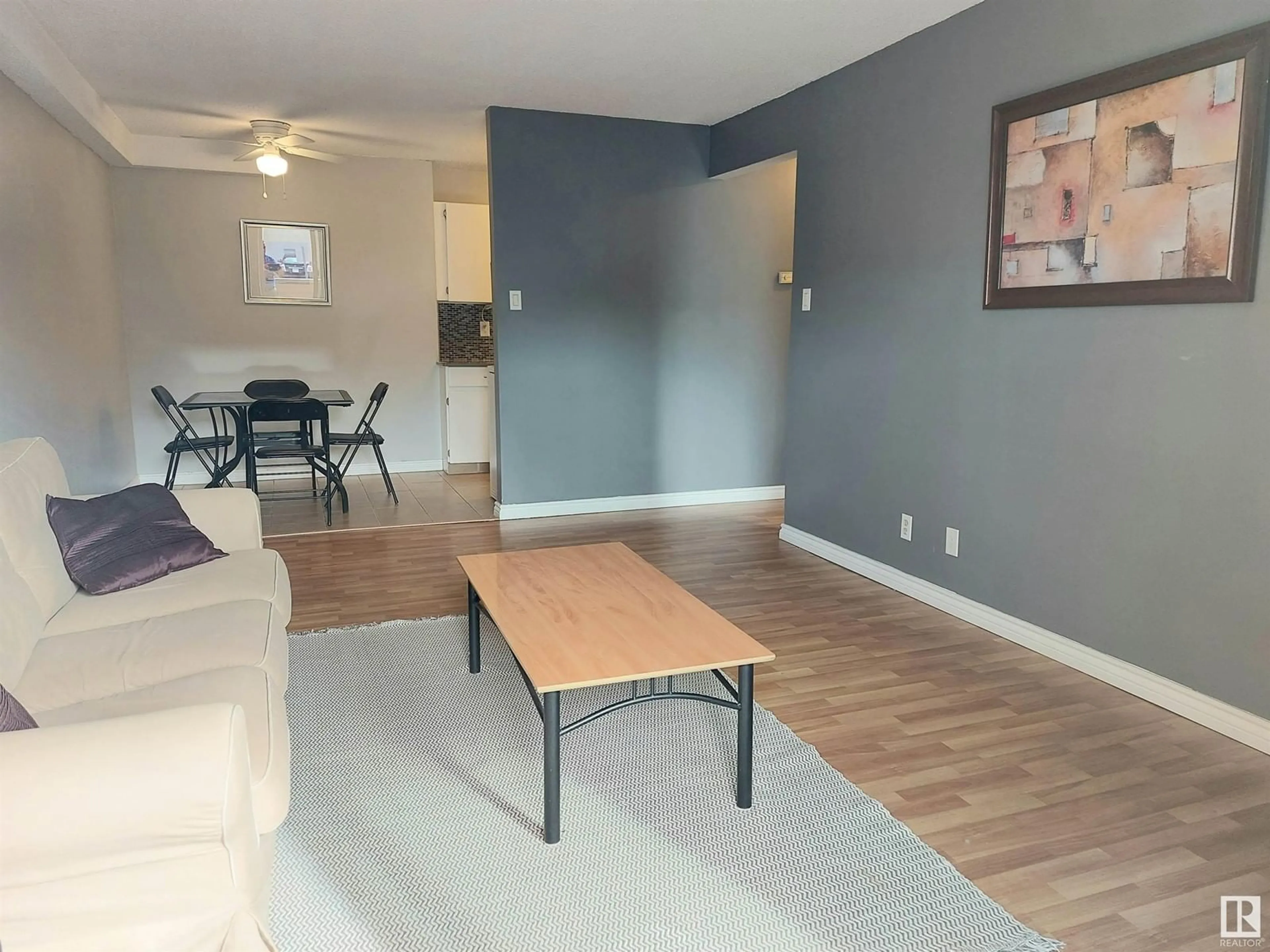 Living room with furniture, unknown for #209 10250 116 ST NW NW, Edmonton Alberta T5K1W9