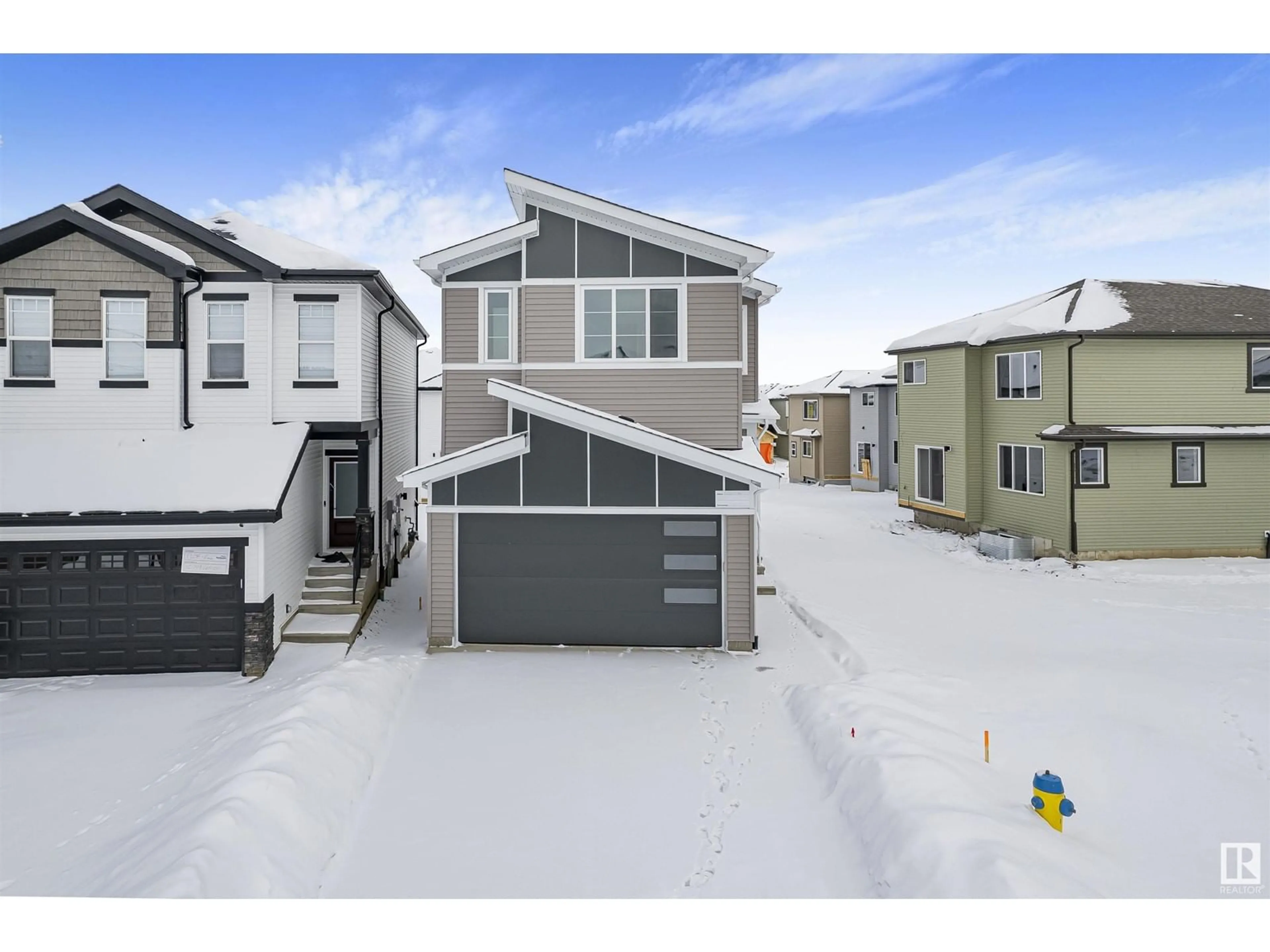 A pic from outside/outdoor area/front of a property/back of a property/a pic from drone, street for 1304 11 AV NW, Edmonton Alberta T6T2W3