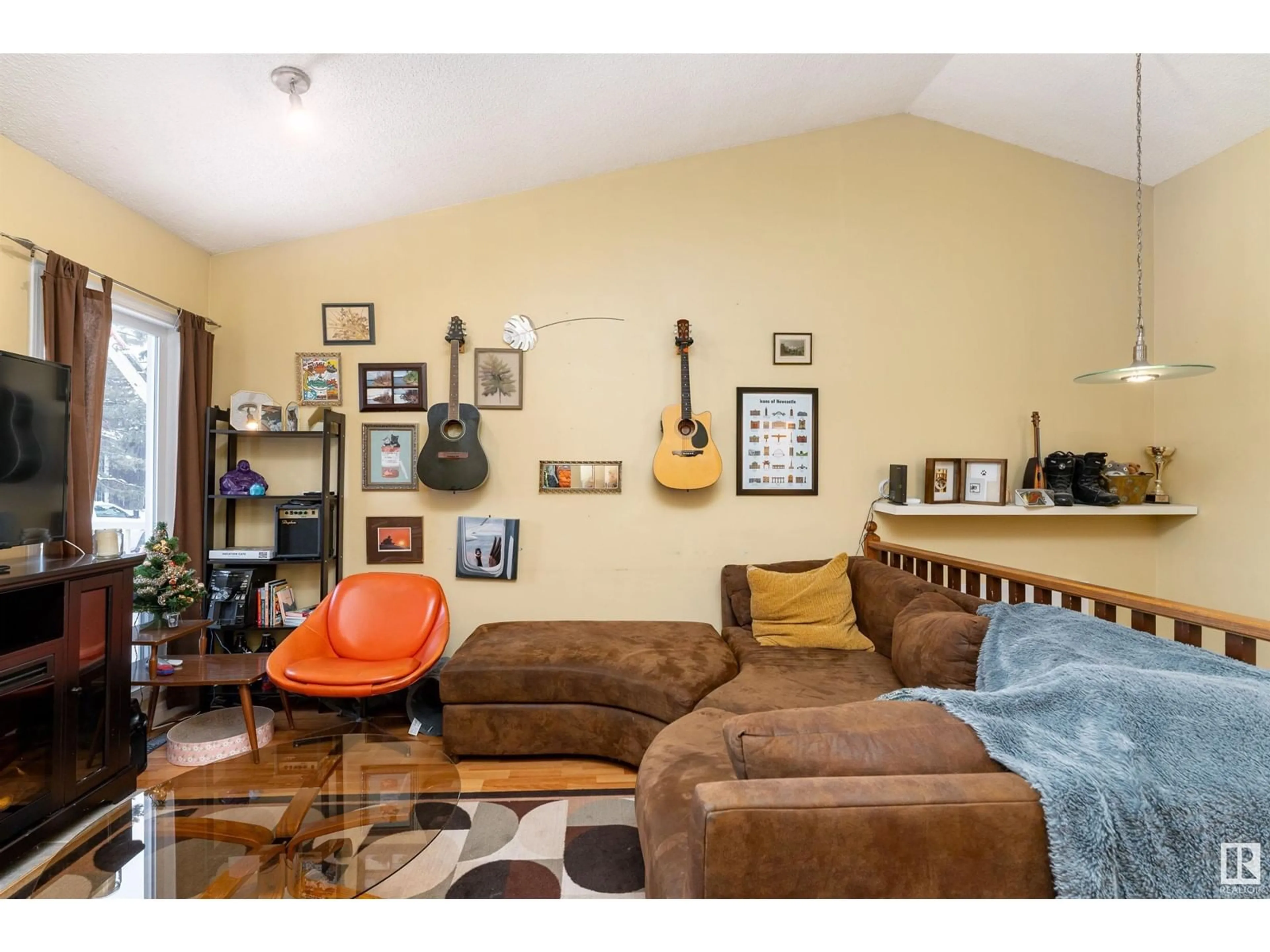 Living room with furniture, wood/laminate floor for #10 1440 Sherwood DR, Sherwood Park Alberta T8A4W3