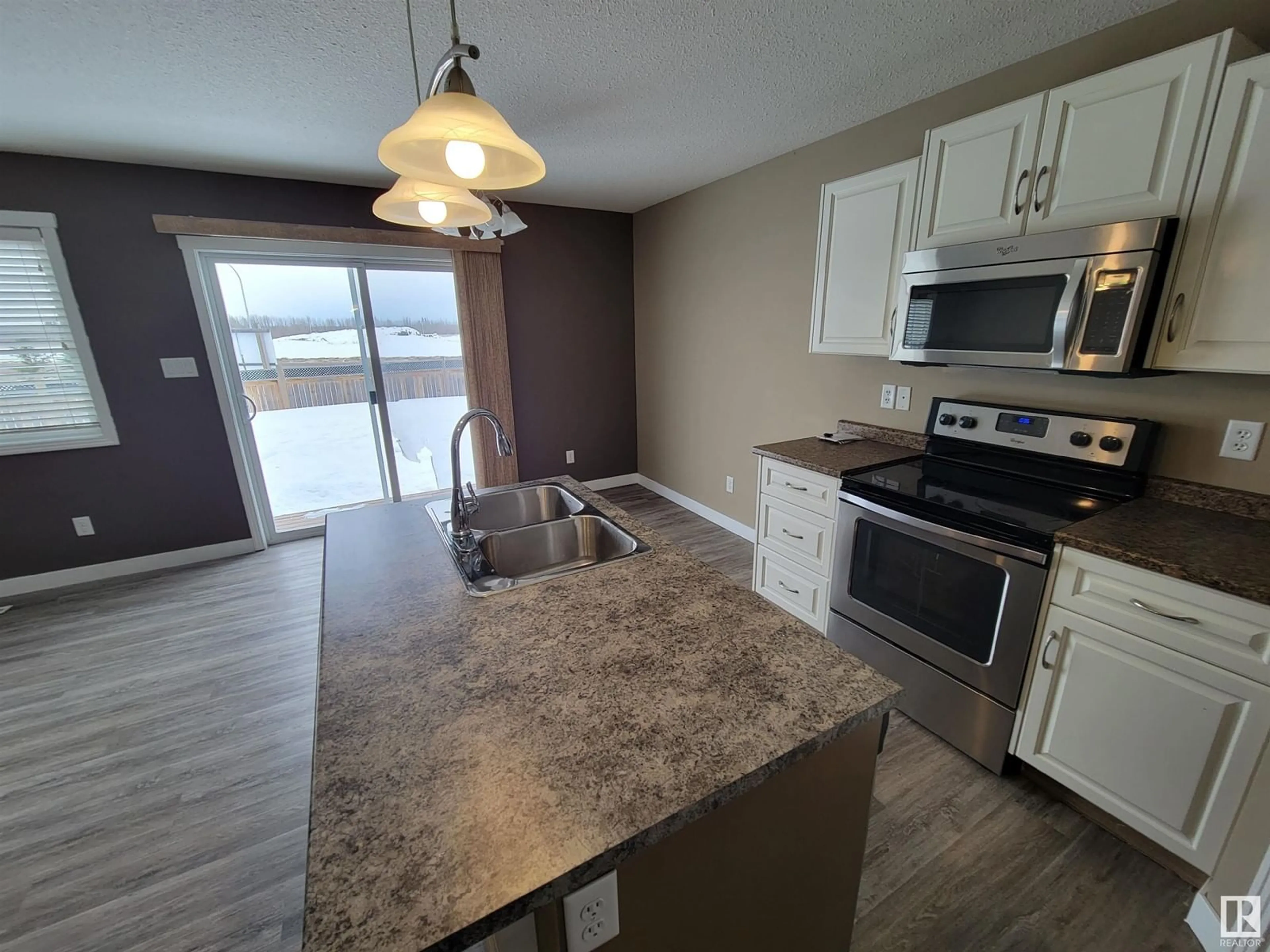 Open concept kitchen, unknown for 703D Rocky WY, Cold Lake Alberta T9M0H3