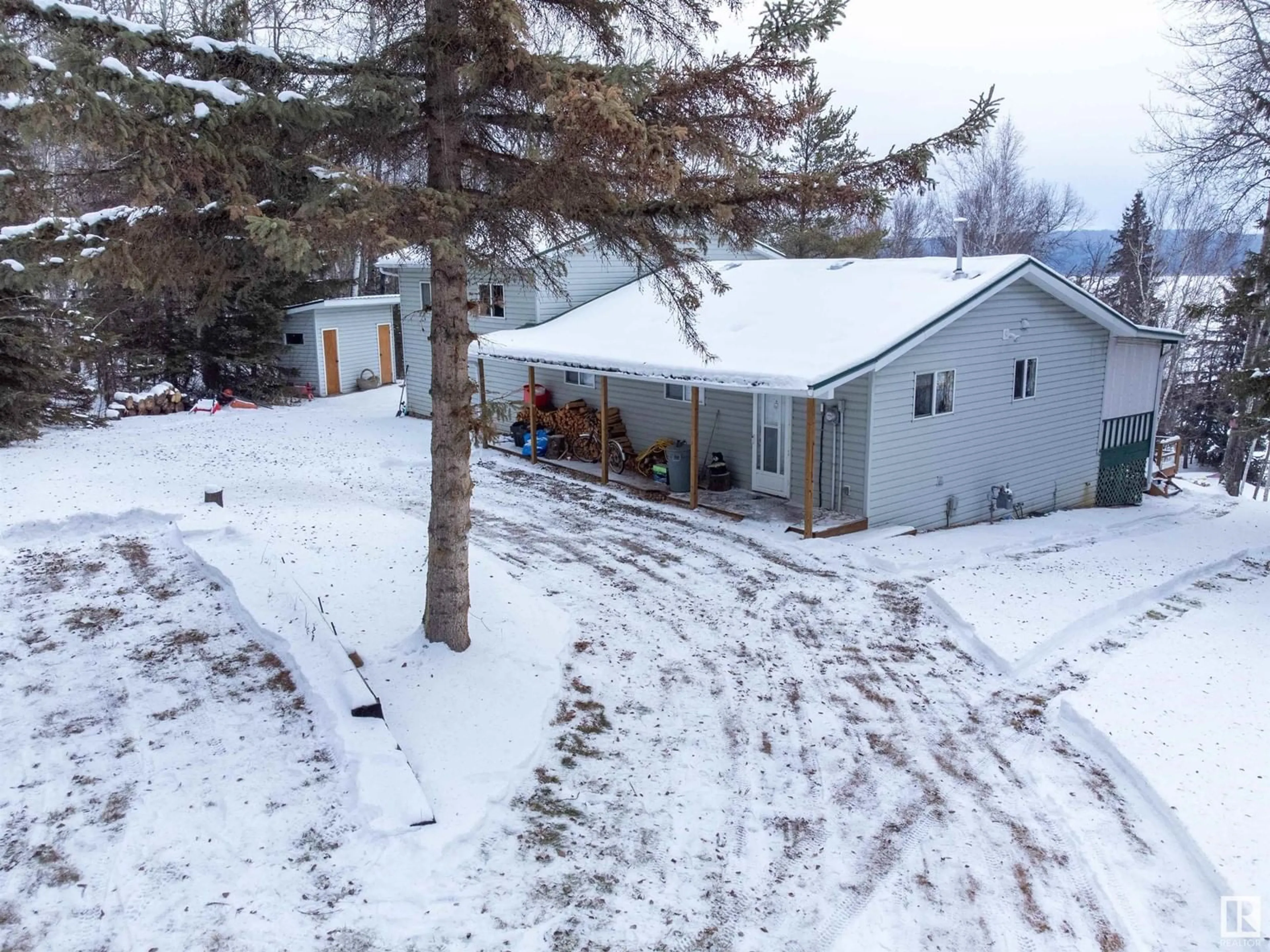 A pic from outside/outdoor area/front of a property/back of a property/a pic from drone, unknown for 250 Lenard DR, Rural Athabasca County Alberta T0A0M0