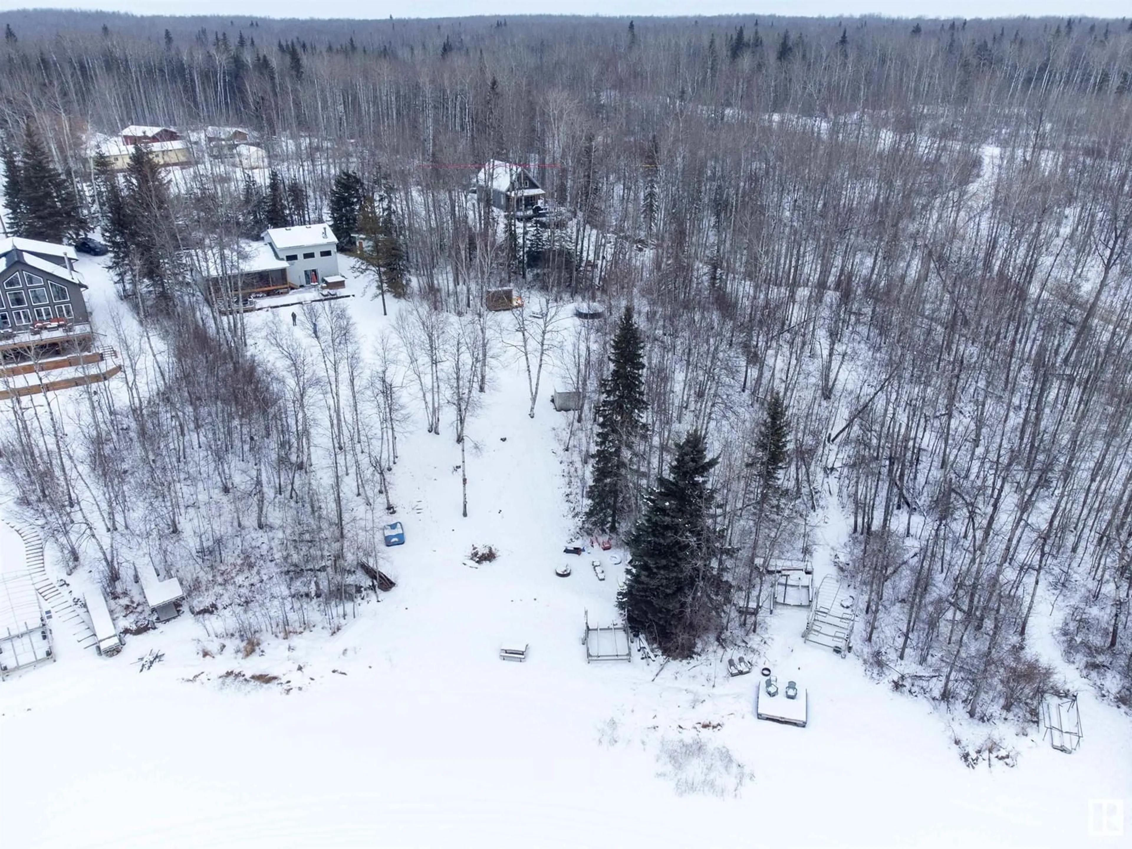 A pic from outside/outdoor area/front of a property/back of a property/a pic from drone, forest/trees view for 250 Lenard DR, Rural Athabasca County Alberta T0A0M0